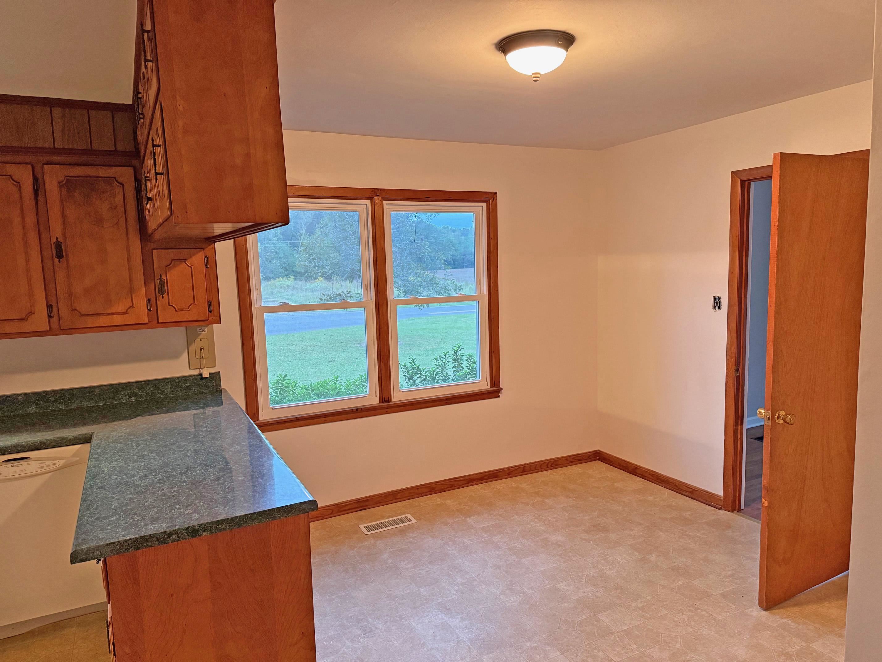 8540-8530 Glendale Road Morris Chapel, TN 38361 - Photo 4 of 21 an empty room with a window