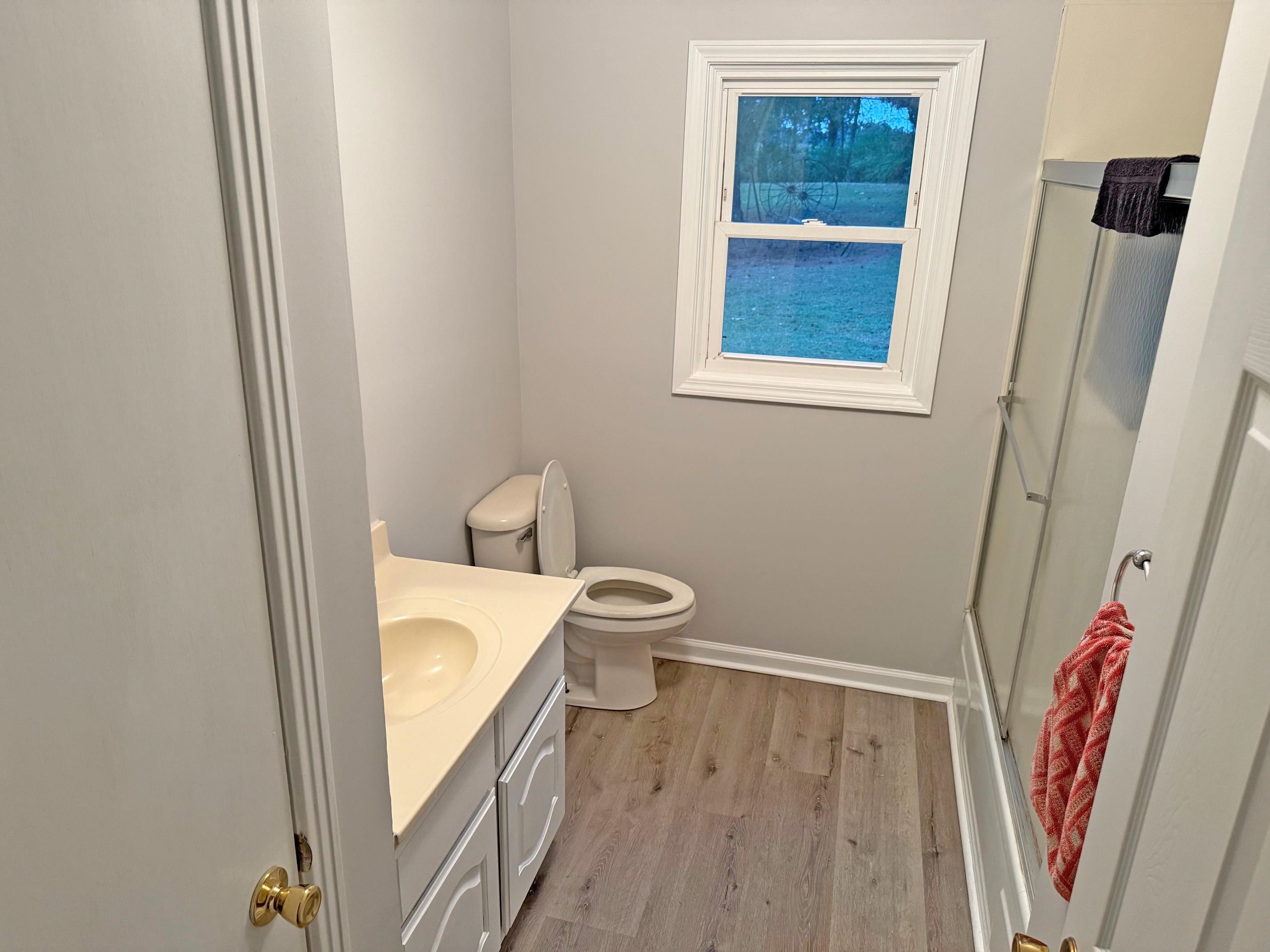 8540-8530 Glendale Road Morris Chapel, TN 38361 - Photo 10 of 21 a bathroom with a sink and a mirror