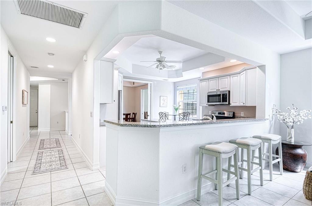 8649 Champions Point, Unit 1201 Naples, FL 34113 - Photo 5 of 23 Breakfast Bar