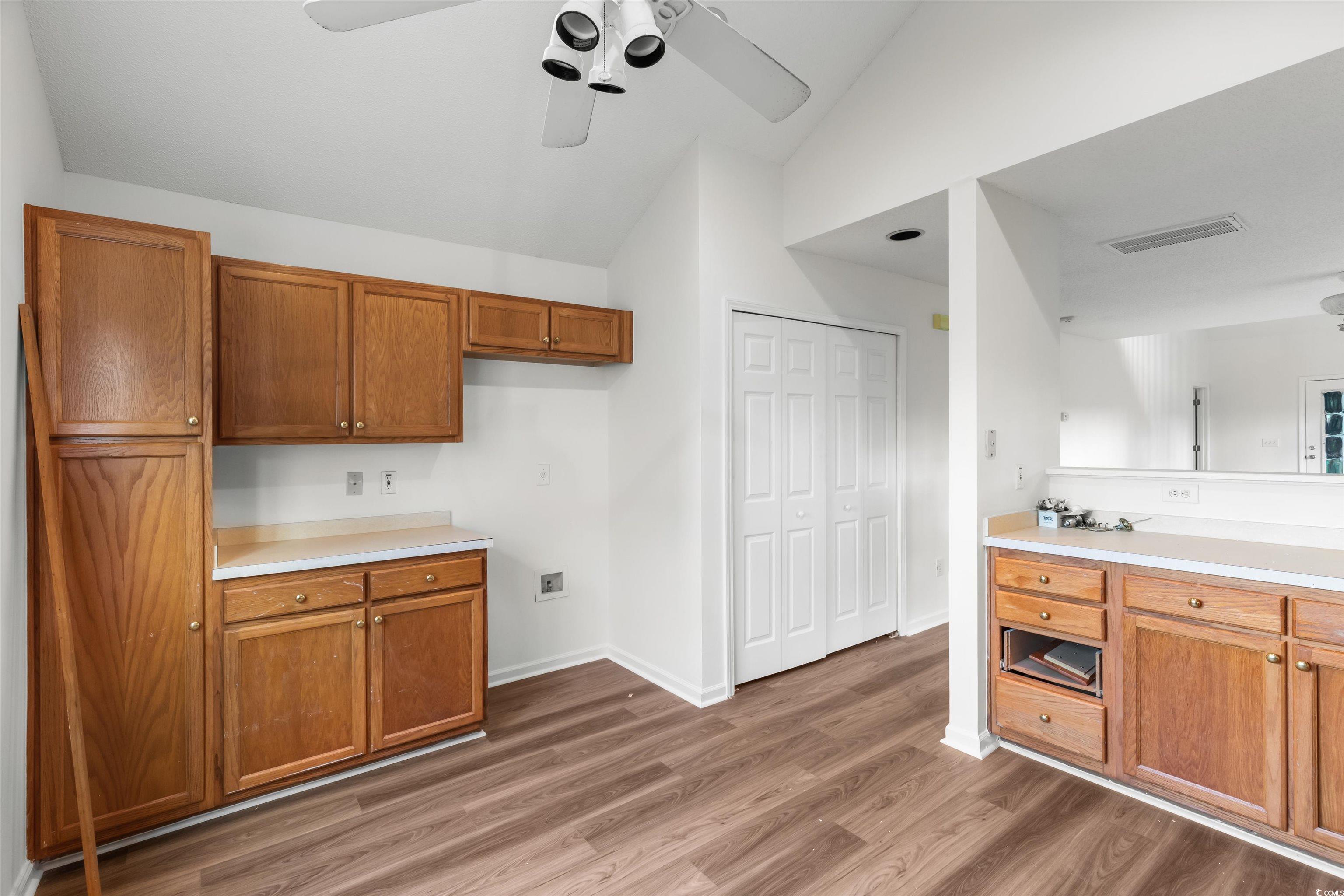 130 Wimbledon Way, Unit 130 Murrells Inlet, SC 29576 - Photo 12 of 38 Kitchen with vaulted ceiling, hardwood / wood-styl