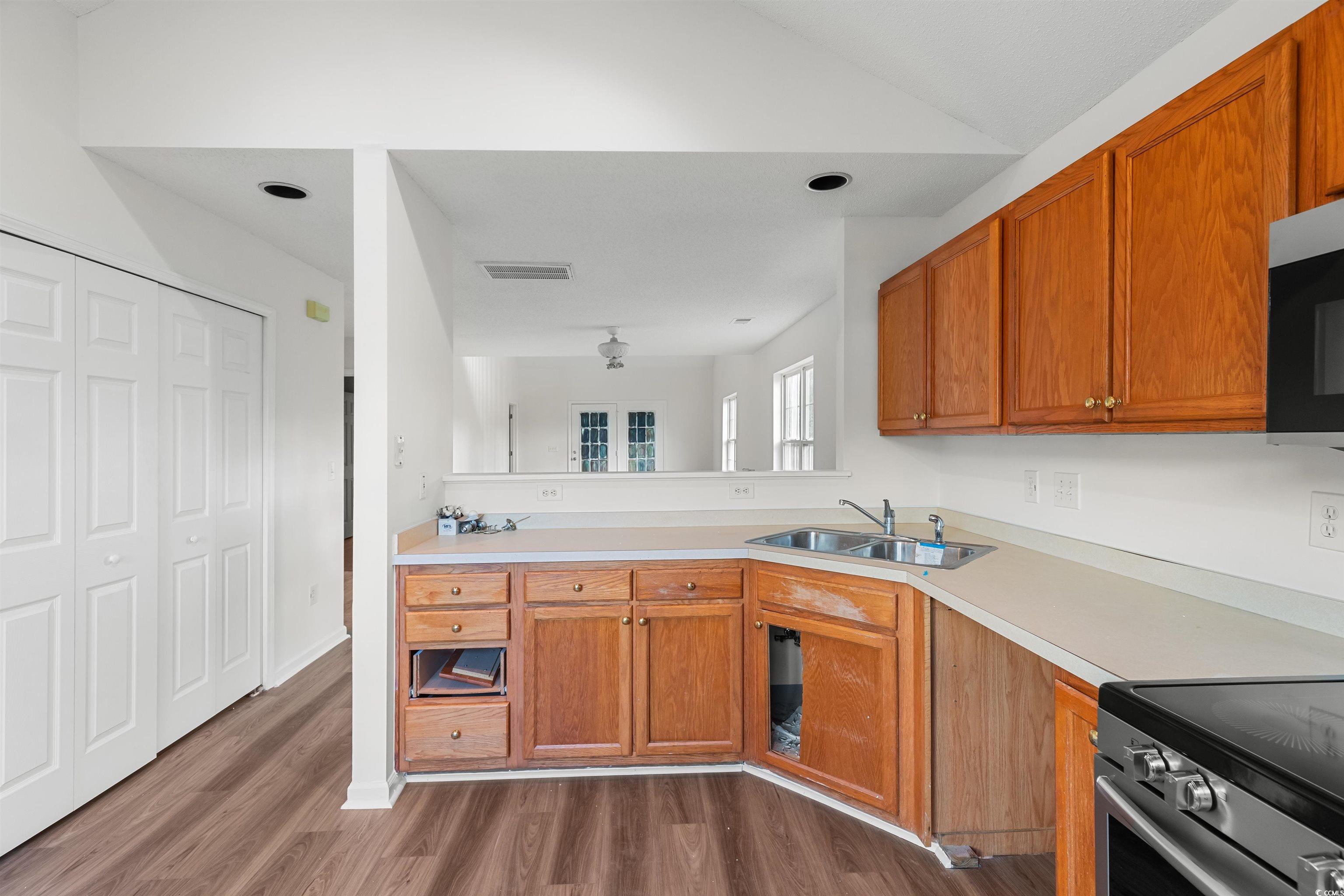 130 Wimbledon Way, Unit 130 Murrells Inlet, SC 29576 - Photo 13 of 38 Kitchen featuring dark hardwood / wood-style floor