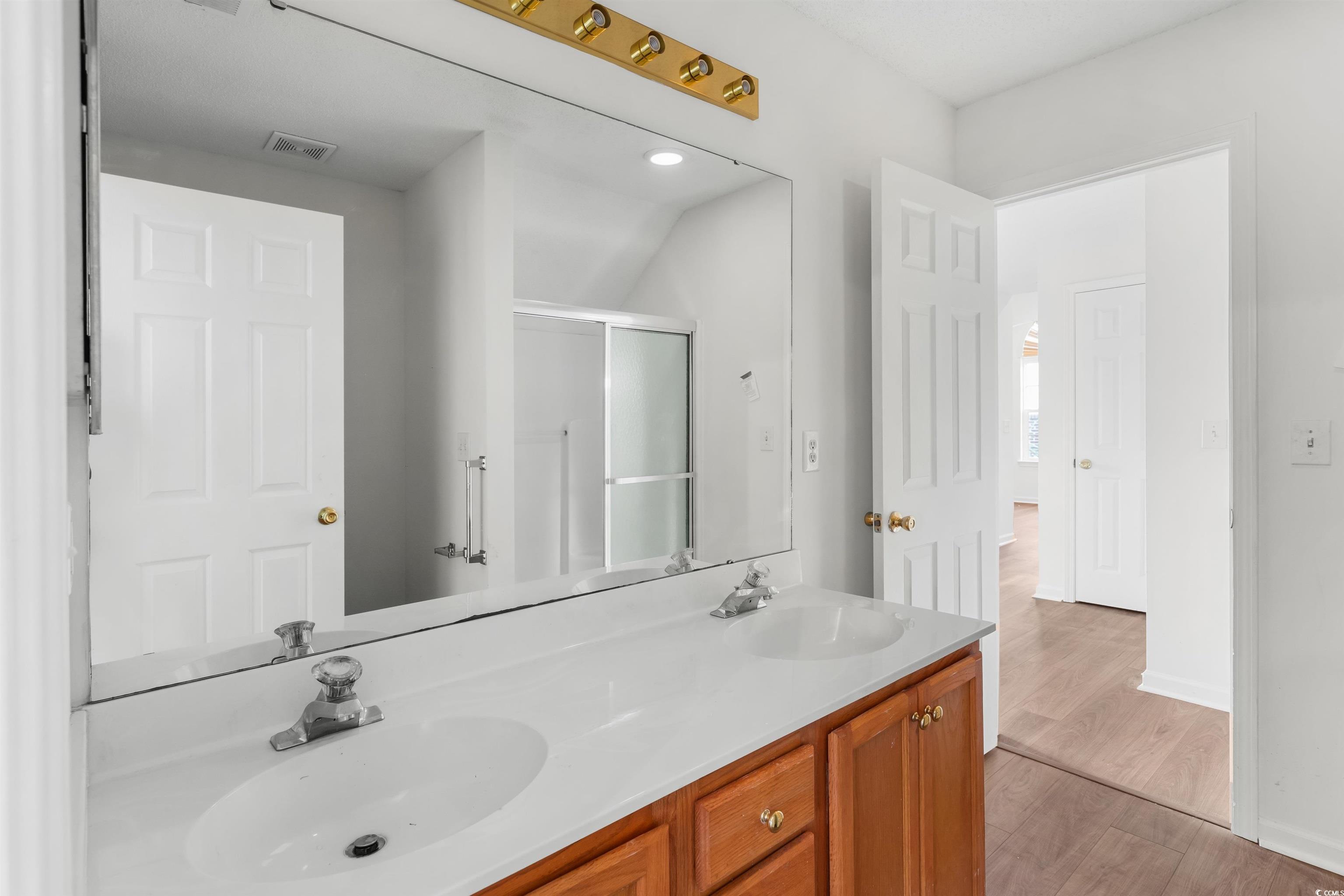 130 Wimbledon Way, Unit 130 Murrells Inlet, SC 29576 - Photo 19 of 38 Bathroom featuring hardwood / wood-style flooring,