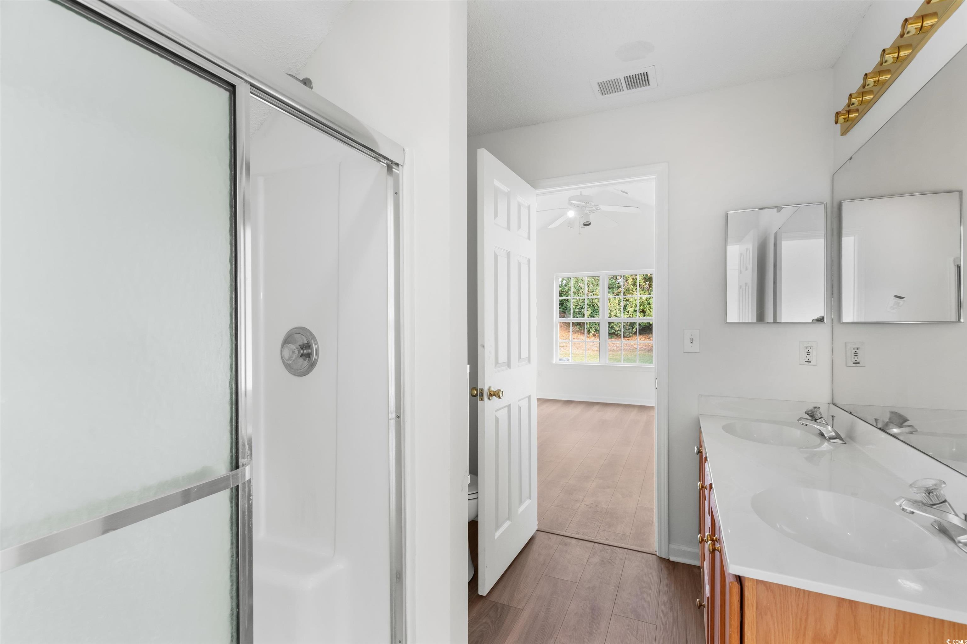 130 Wimbledon Way, Unit 130 Murrells Inlet, SC 29576 - Photo 20 of 38 Bathroom featuring hardwood / wood-style floors, c