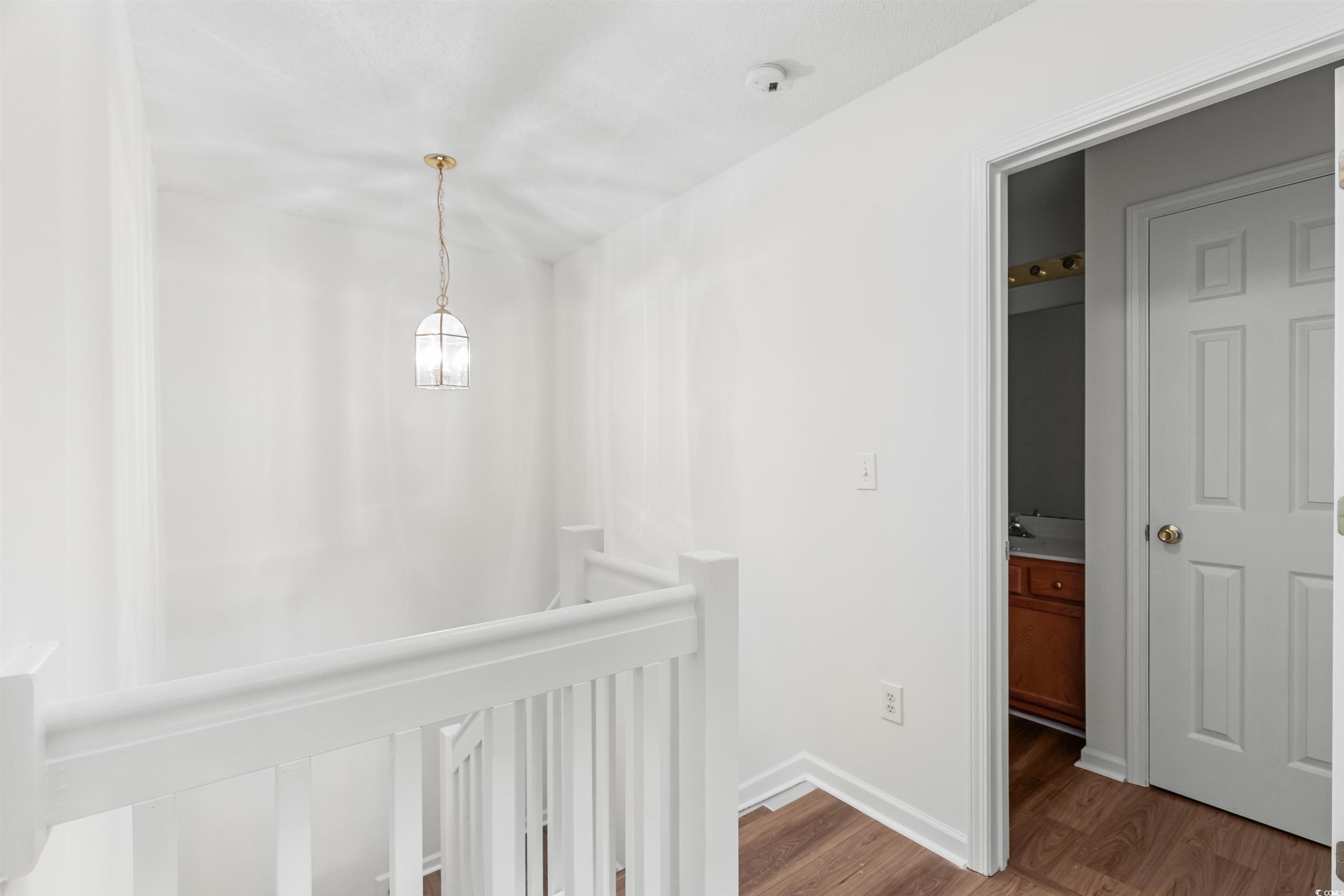 130 Wimbledon Way, Unit 130 Murrells Inlet, SC 29576 - Photo 21 of 38 Hall with hardwood / wood-style flooring