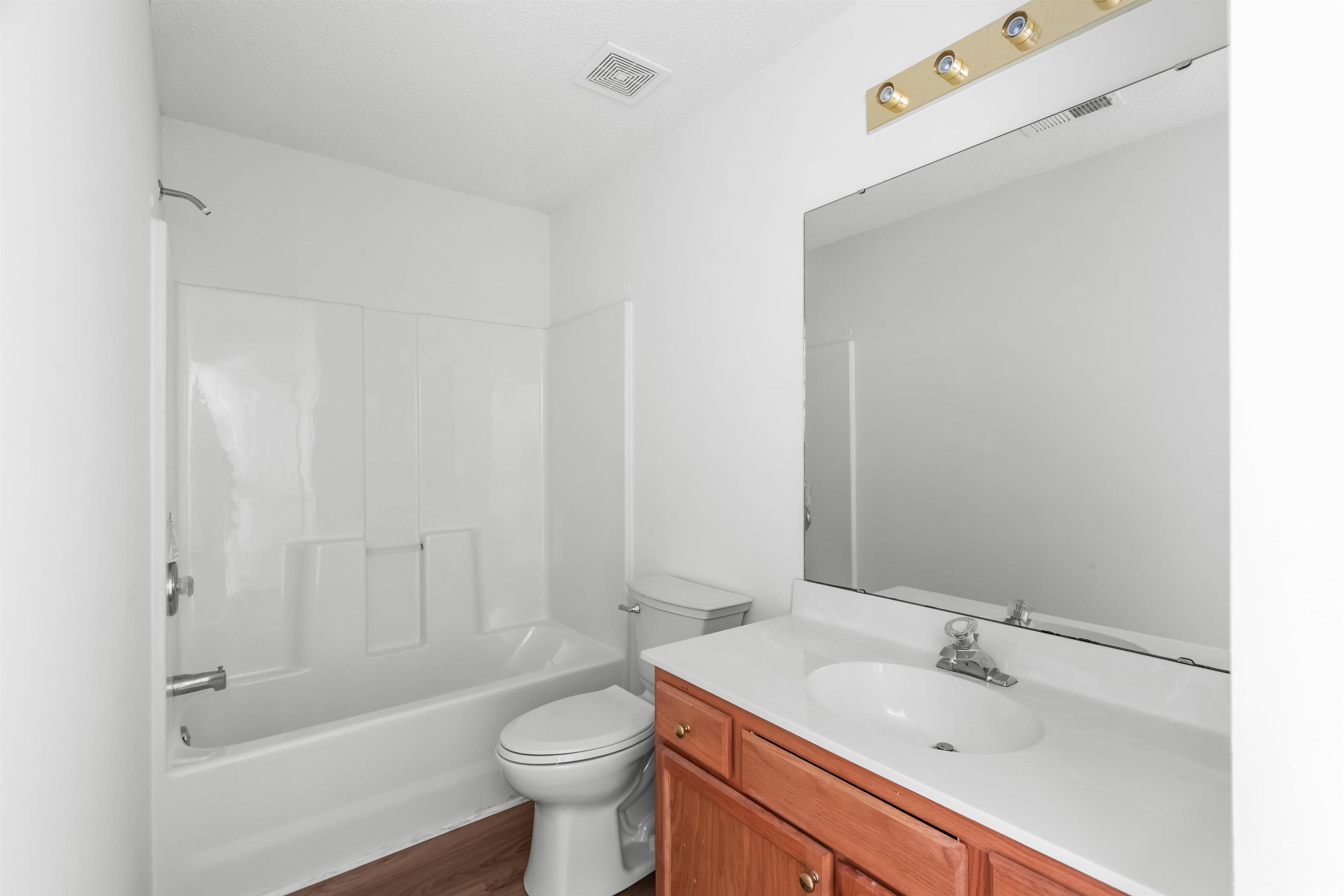 130 Wimbledon Way, Unit 130 Murrells Inlet, SC 29576 - Photo 22 of 38 Full bathroom with tub / shower combination, wood-