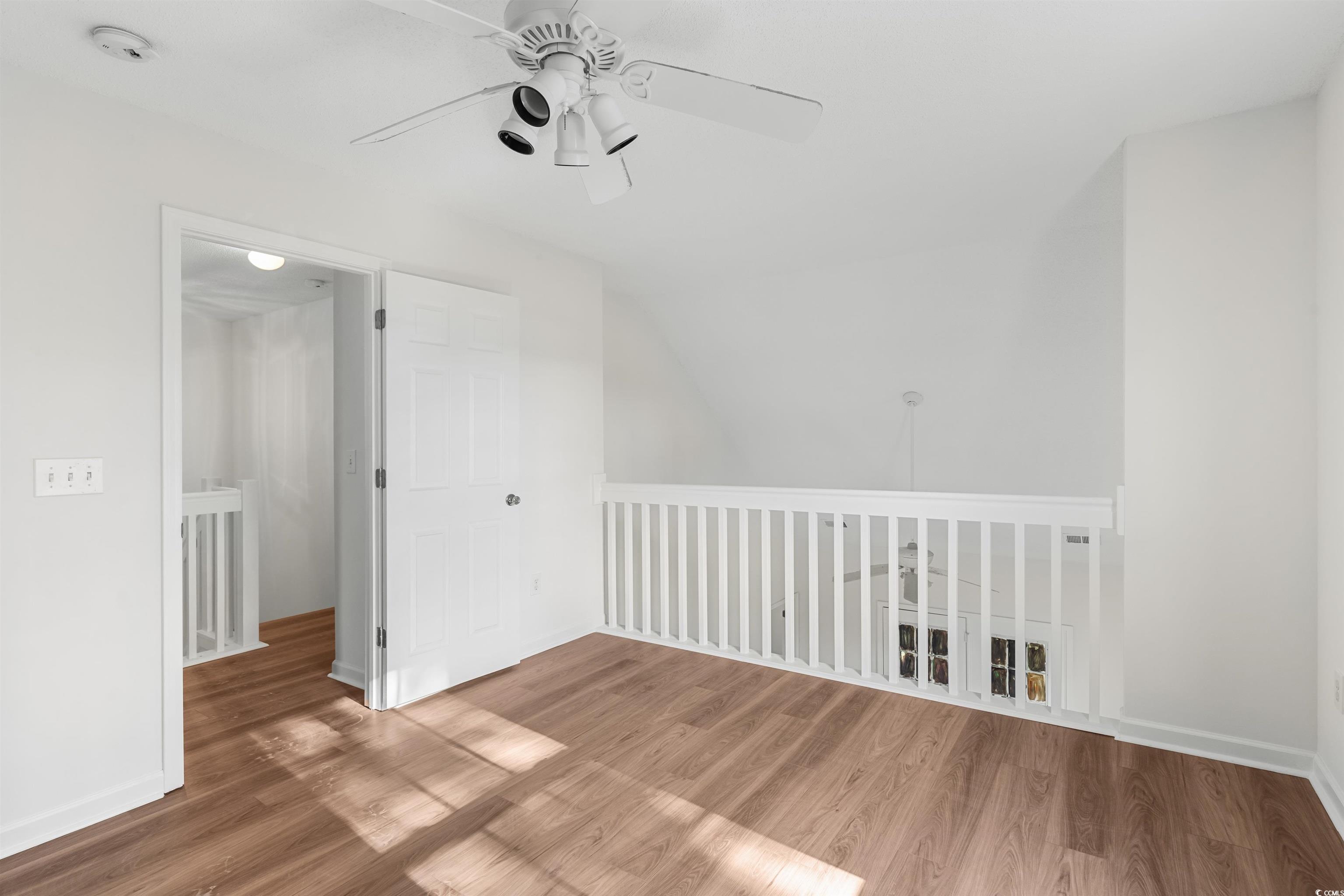 130 Wimbledon Way, Unit 130 Murrells Inlet, SC 29576 - Photo 27 of 38 Bonus room with hardwood / wood-style flooring and