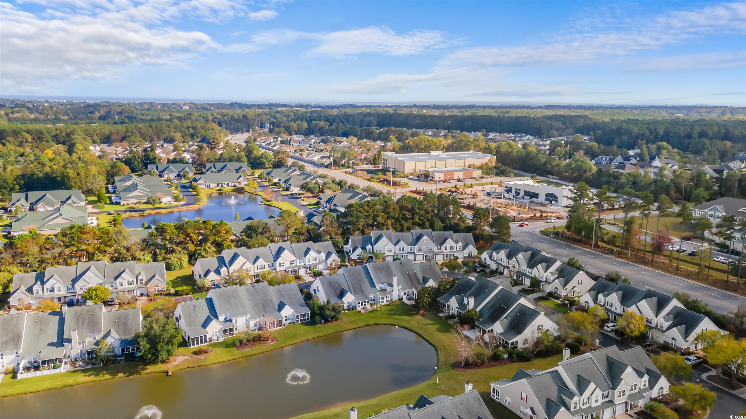 130 Wimbledon Way, Unit 130 Murrells Inlet, SC 29576 - Photo 37 of 38 Drone / aerial view featuring a water view