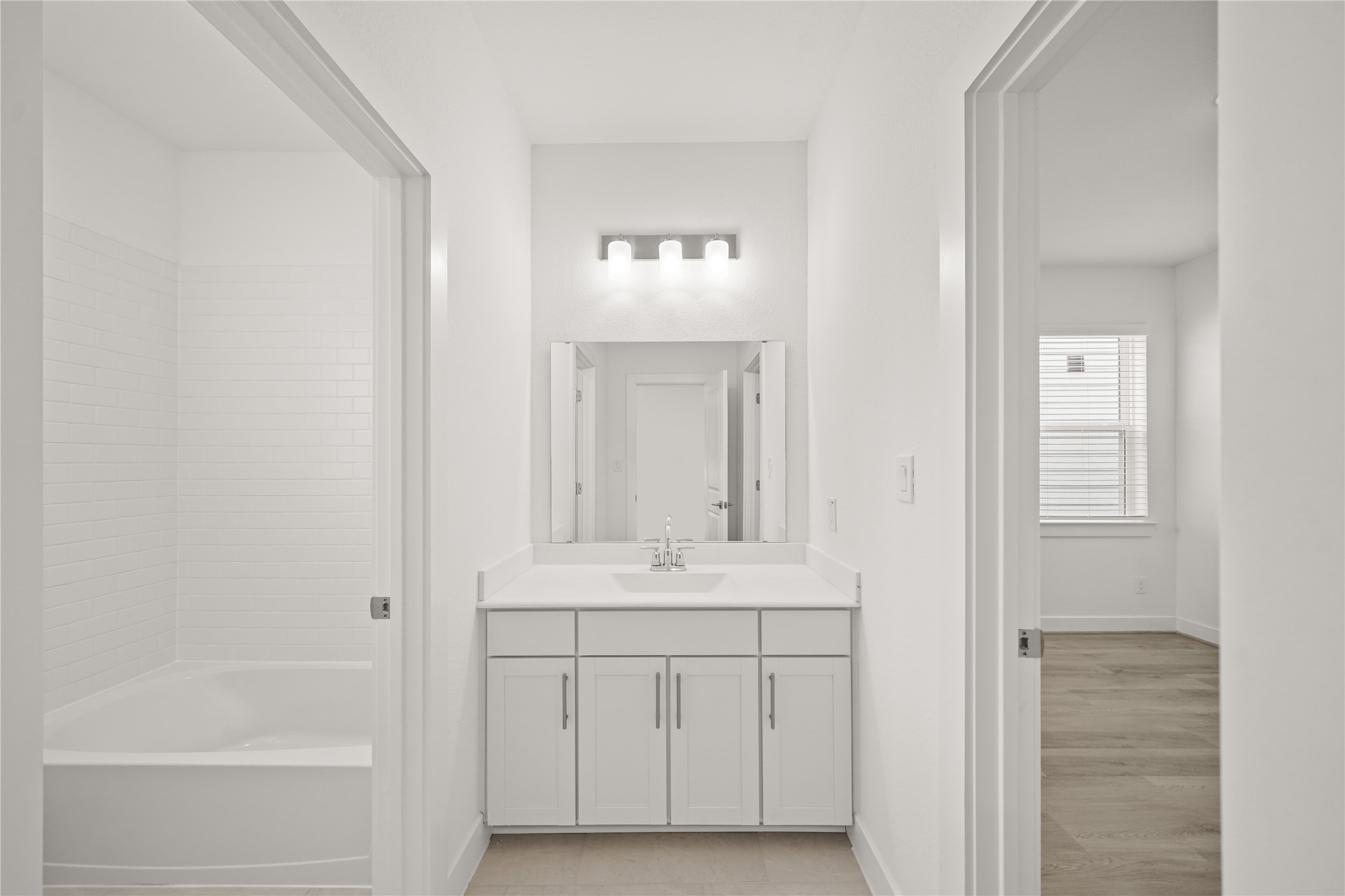 2314 Via Isa Lane Houston, TX 77051 - Photo 13 of 29 a bathroom with a sink and a mirror