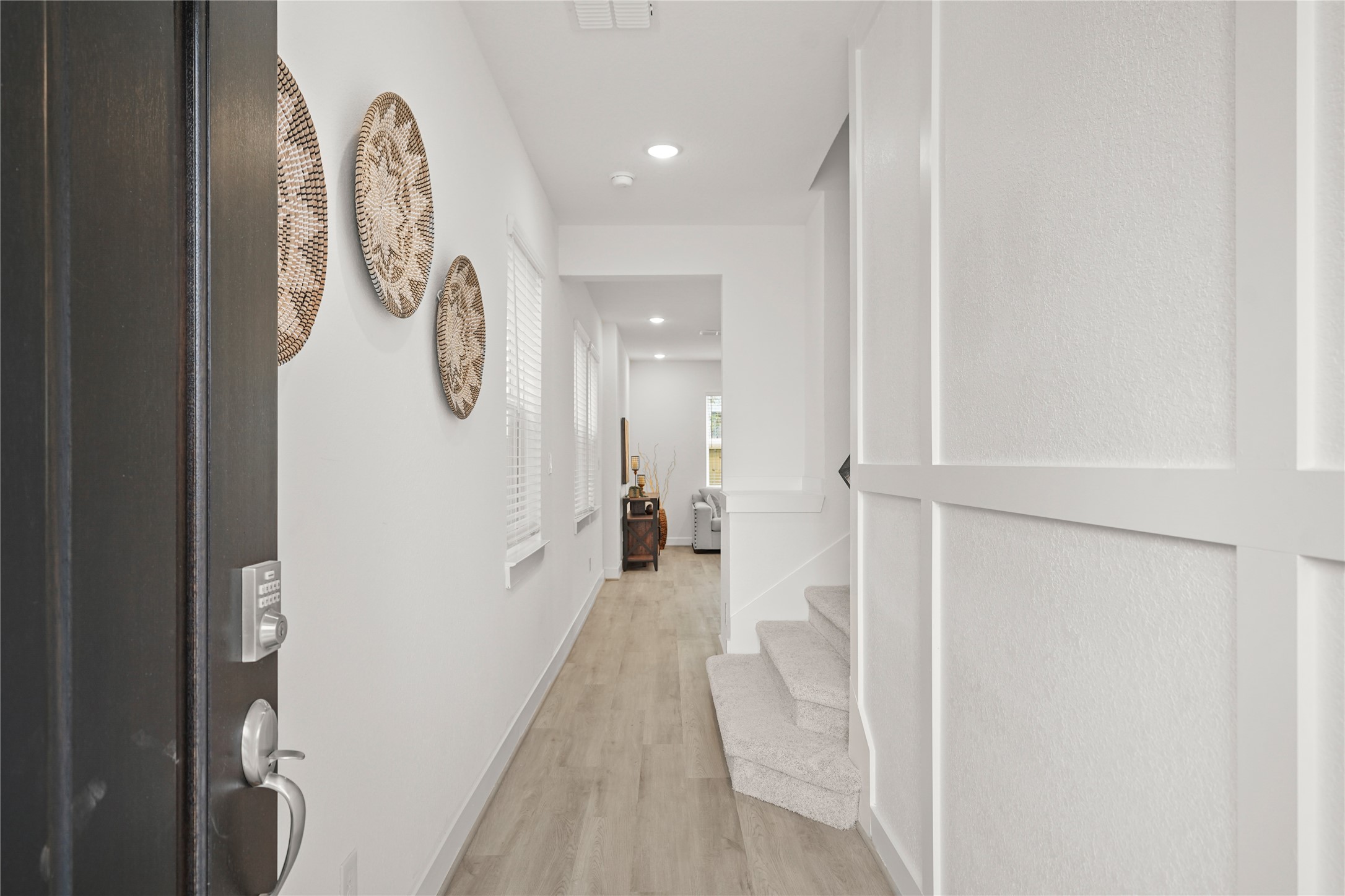 2314 Via Isa Lane Houston, TX 77051 - Photo 3 of 29 a view of a hallway with wooden floor