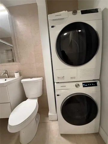 a bathroom with a toilet and a sink