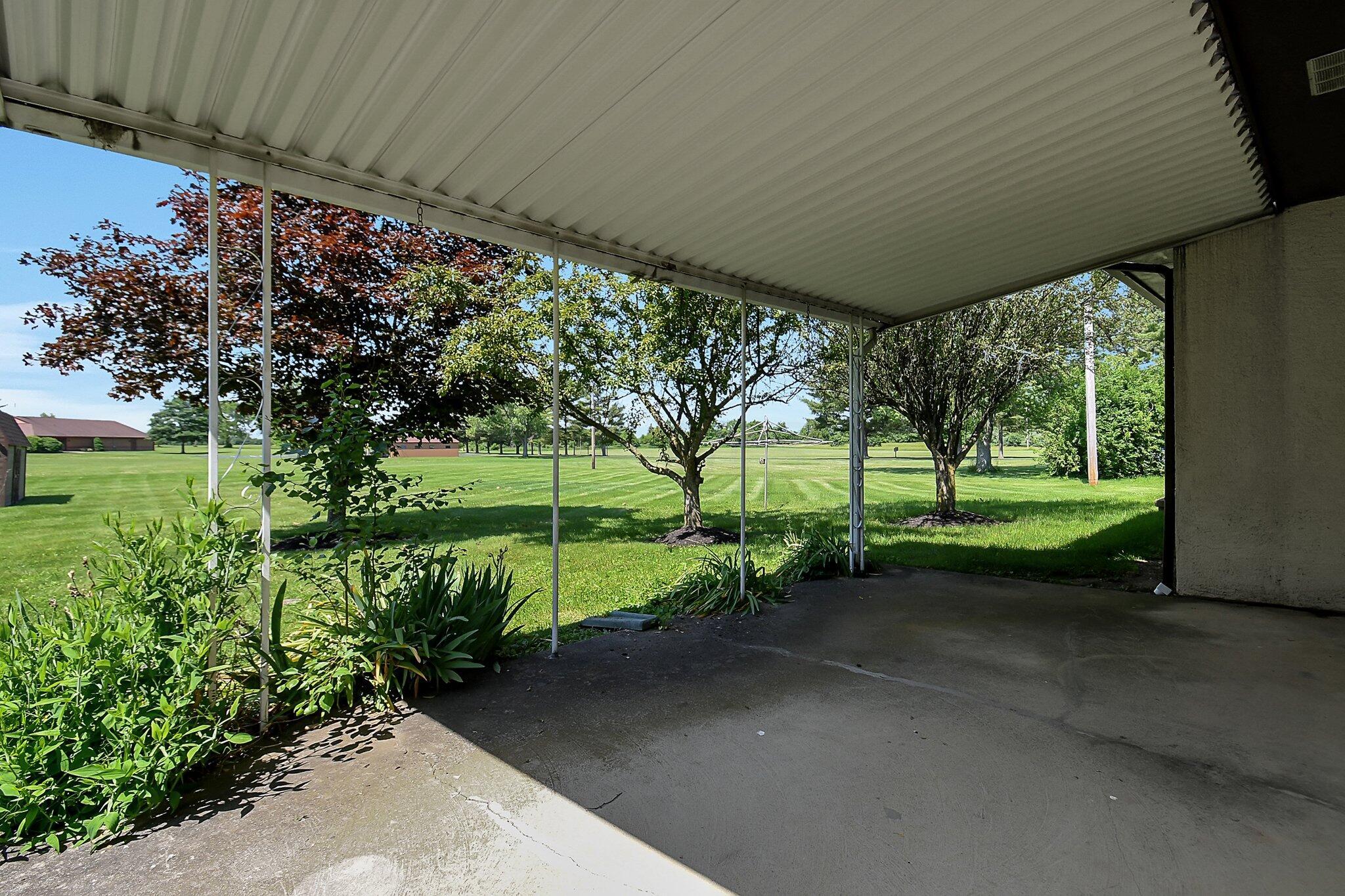 429 Amity Road Galloway, OH 43119 - Photo 25 of 27 concrete covered patio