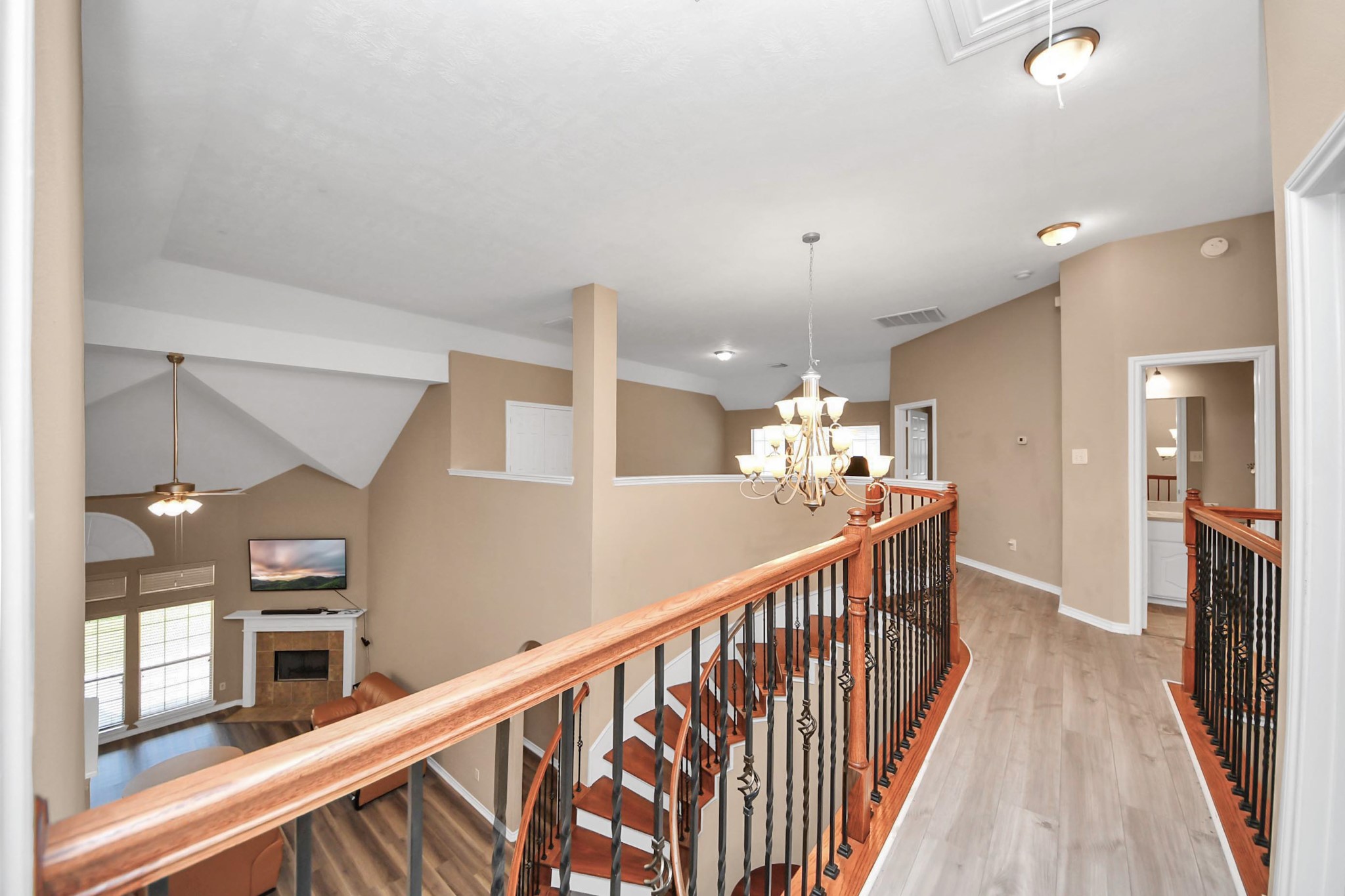 706 River Delta Lane Rosenberg, TX 77469 - Photo 42 of 50 a view of a hallway with a chandelier