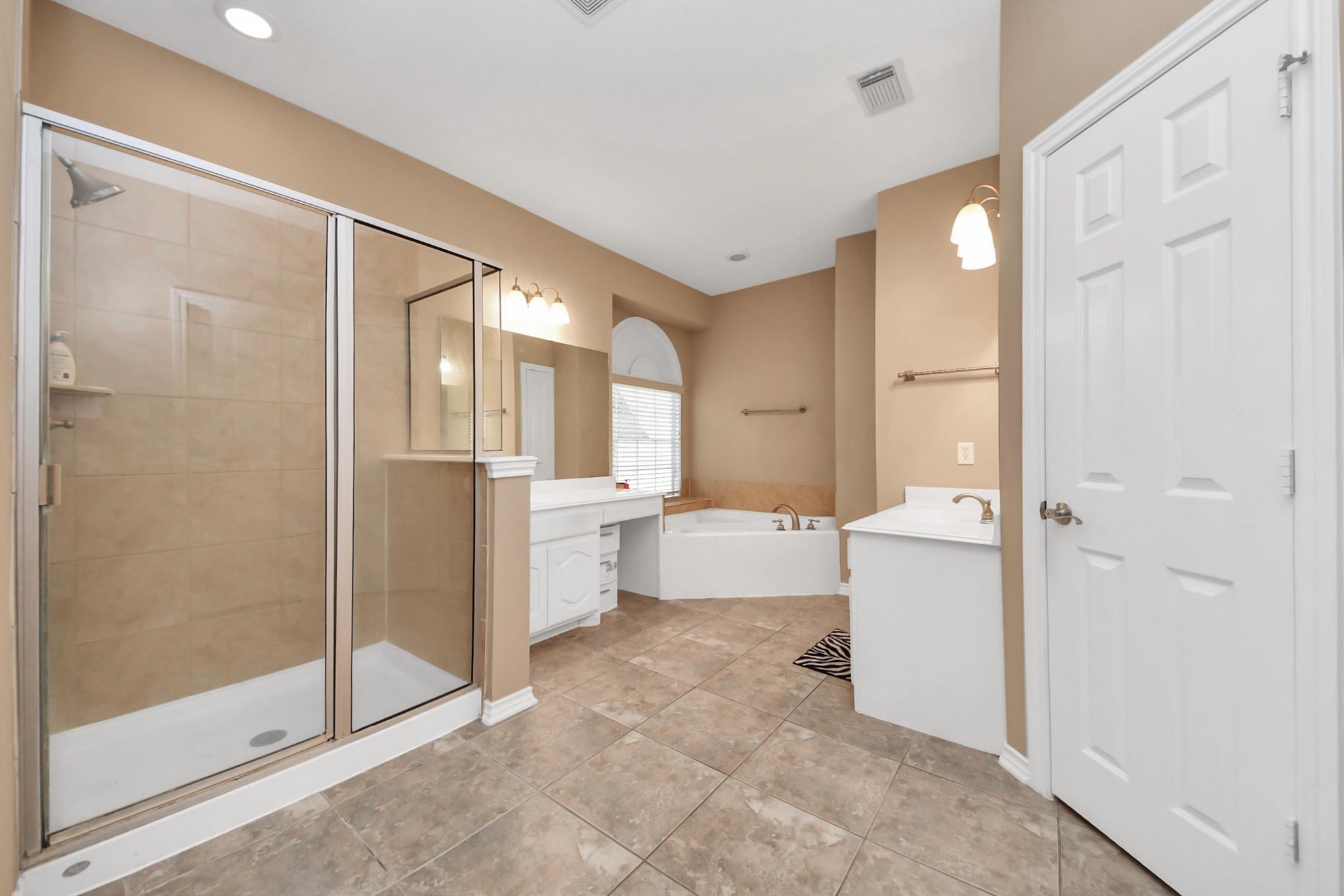 706 River Delta Lane Rosenberg, TX 77469 - Photo 43 of 50 a spacious bathroom with a glass shower door and a sink