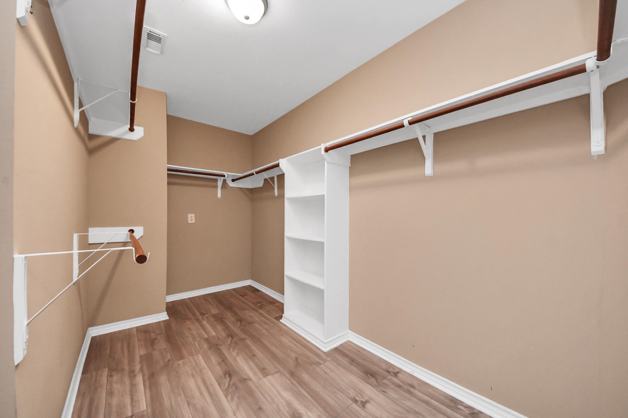 706 River Delta Lane Rosenberg, TX 77469 - Photo 46 of 50 a view of walk in closet with empty racks