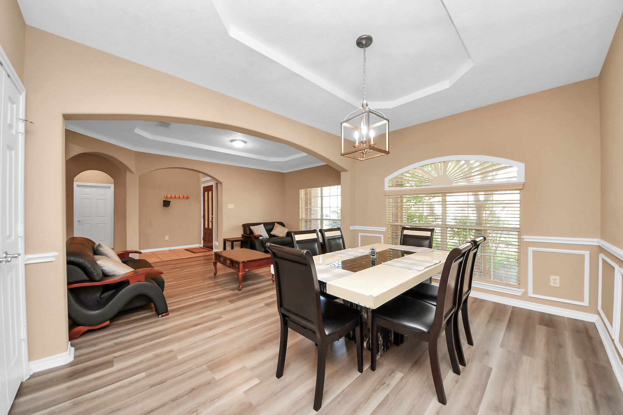 706 River Delta Lane Rosenberg, TX 77469 - Photo 8 of 50 a view of a dining room with furniture window and wooden floor