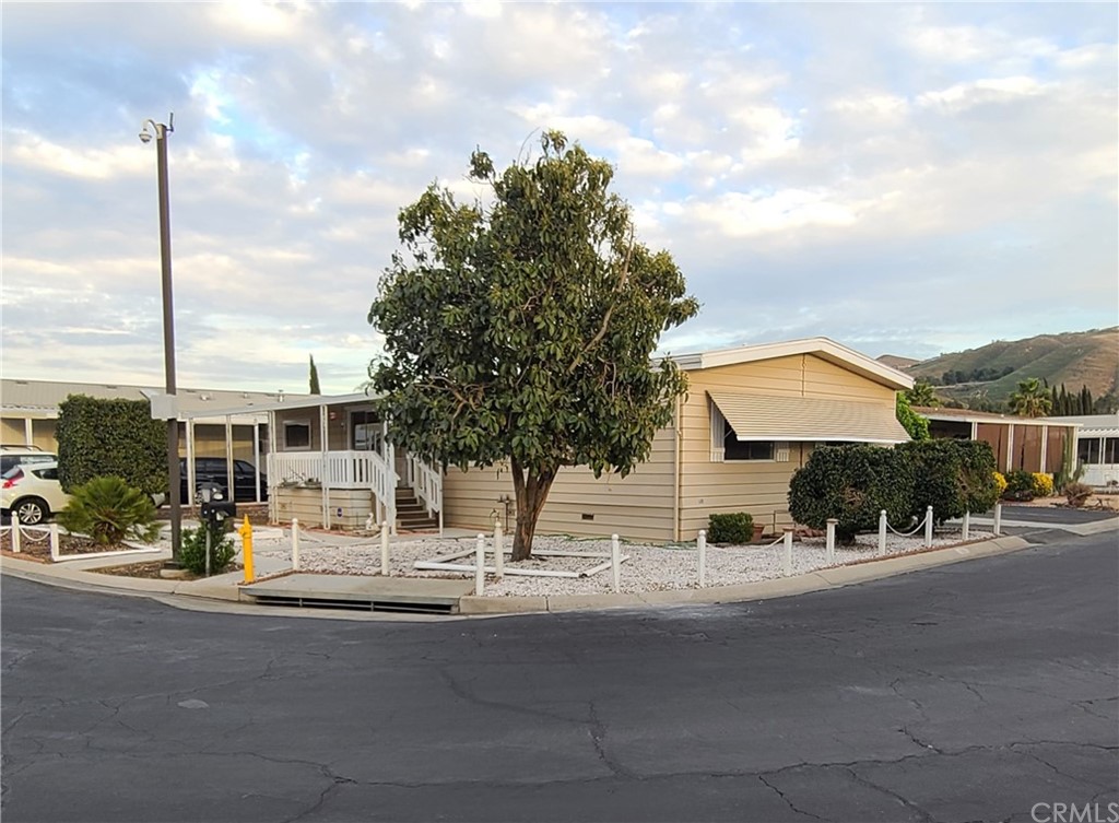 a view of a building with sitting area