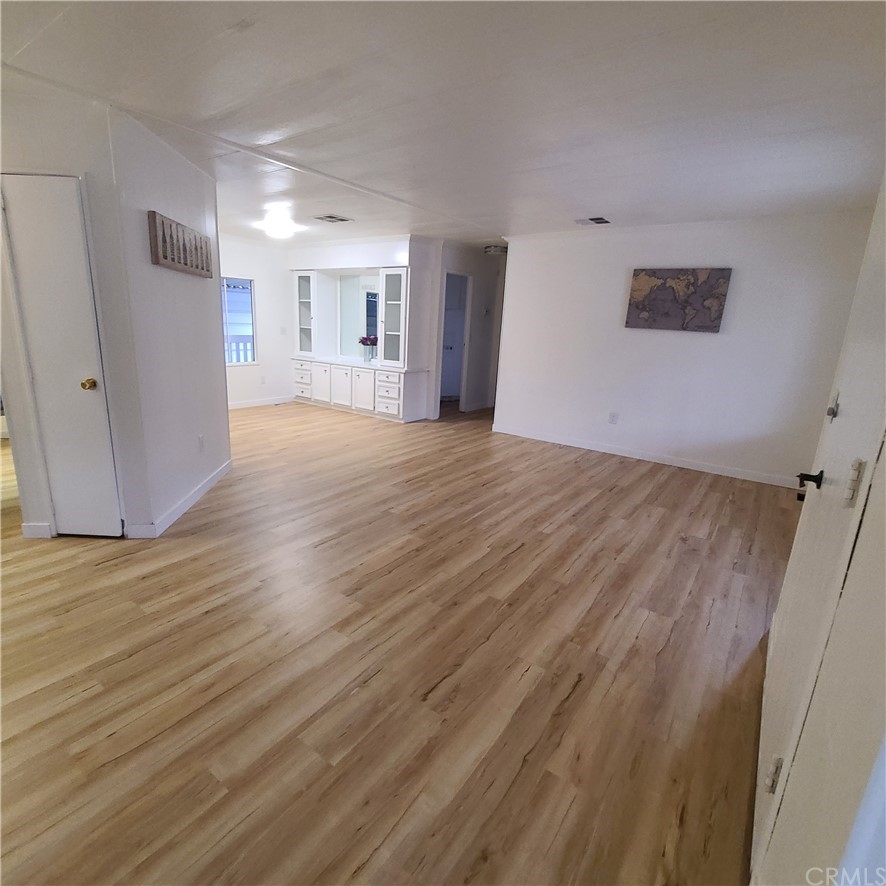 3700 Buchanan, Unit 98 Corona, CA 92503 - Photo 20 of 24 a view of empty room with wooden floor