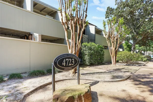 a sign that is on the side of a road