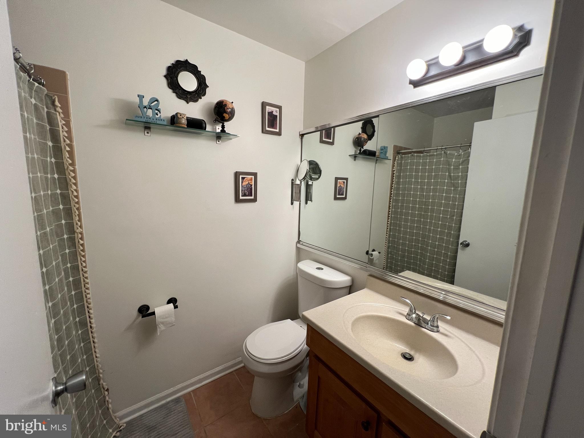 87 Whetstone Road Horsham, PA 19044 - Photo 15 of 20 a bathroom with a sink toilet and shower