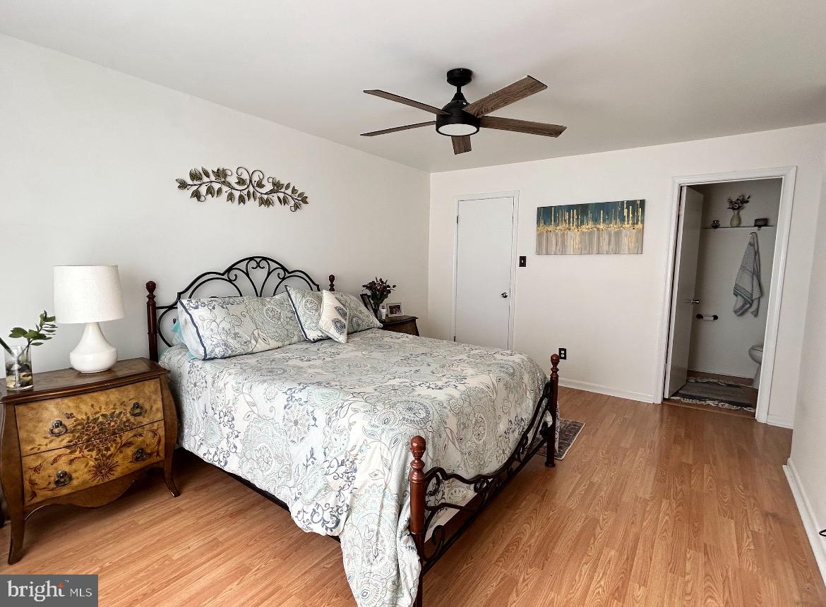 87 Whetstone Road Horsham, PA 19044 - Photo 19 of 20 a bedroom with a bed and wooden floor