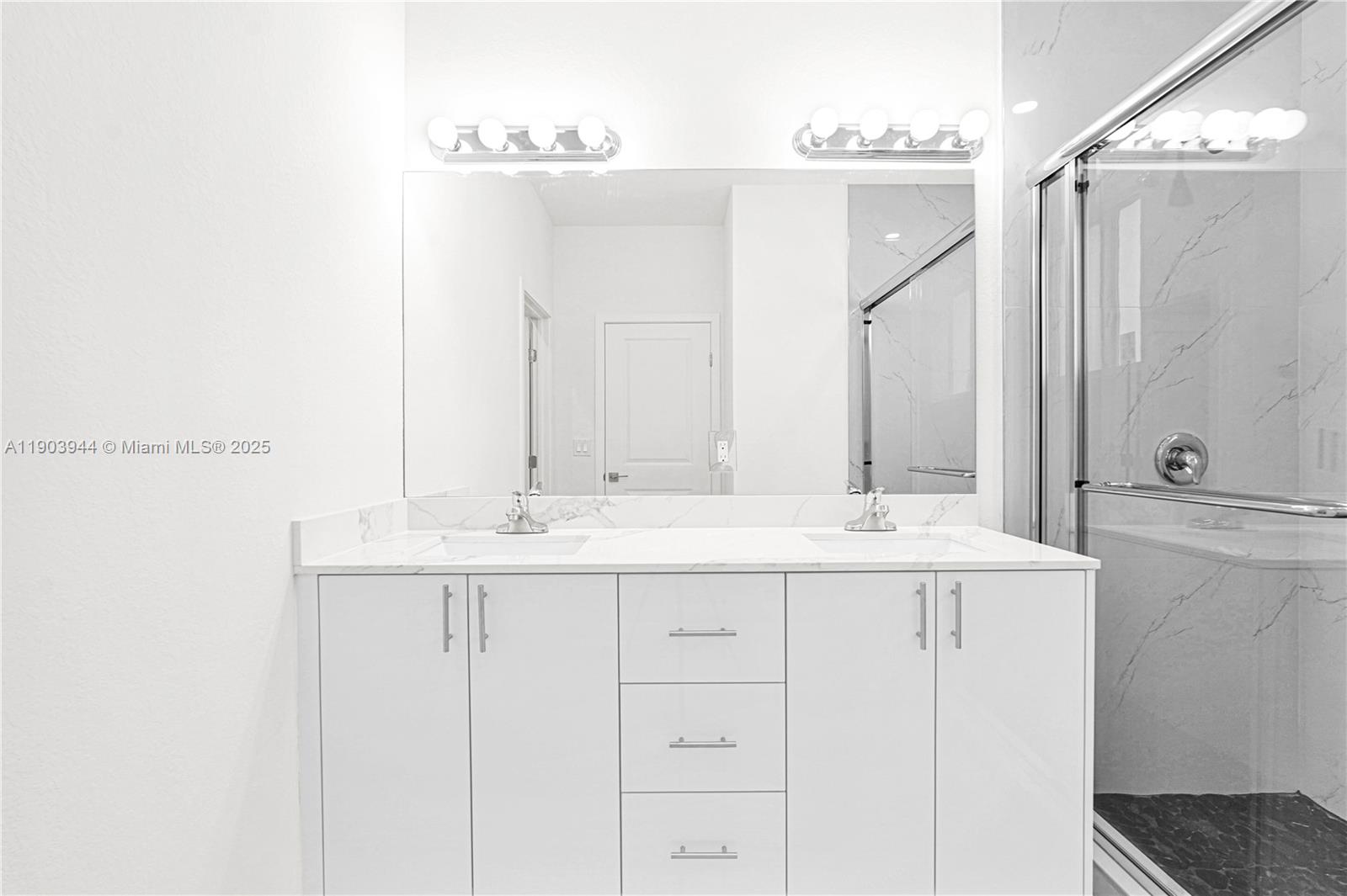 22555 Southwest 125th Avenue, Unit 13A Miami, FL 33170 - Photo 64 of 100 a bathroom with a sink and a mirror