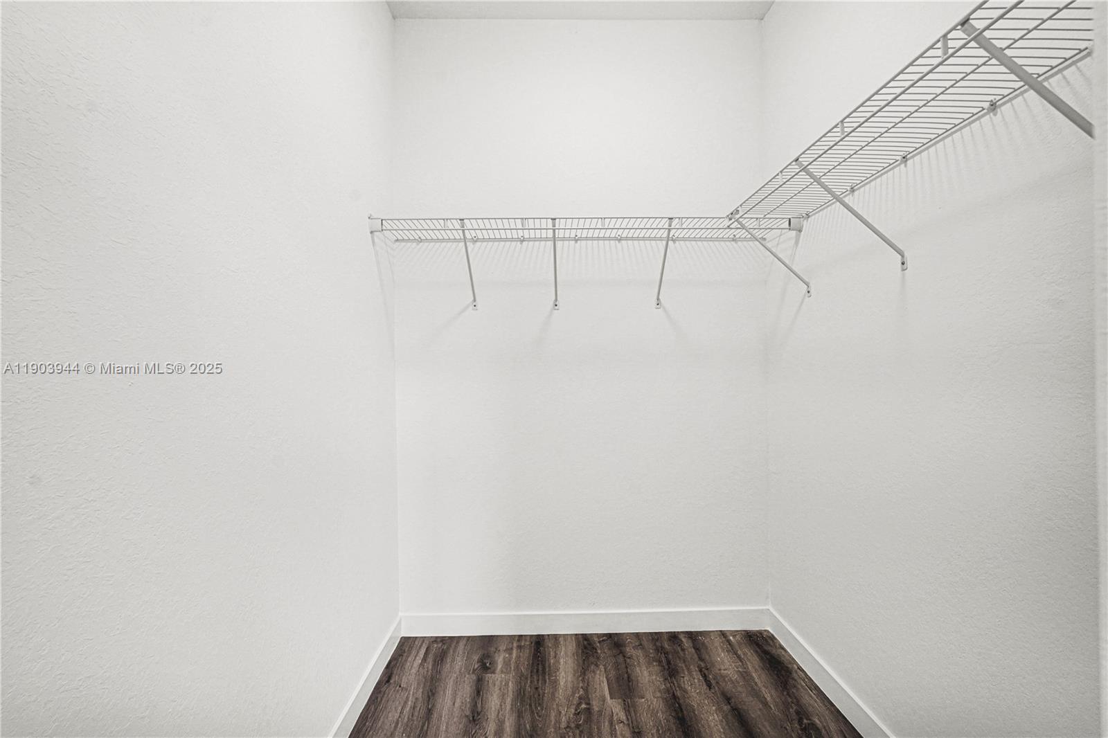 22555 Southwest 125th Avenue, Unit 13A Miami, FL 33170 - Photo 67 of 100 a view of a room with racks on the wall