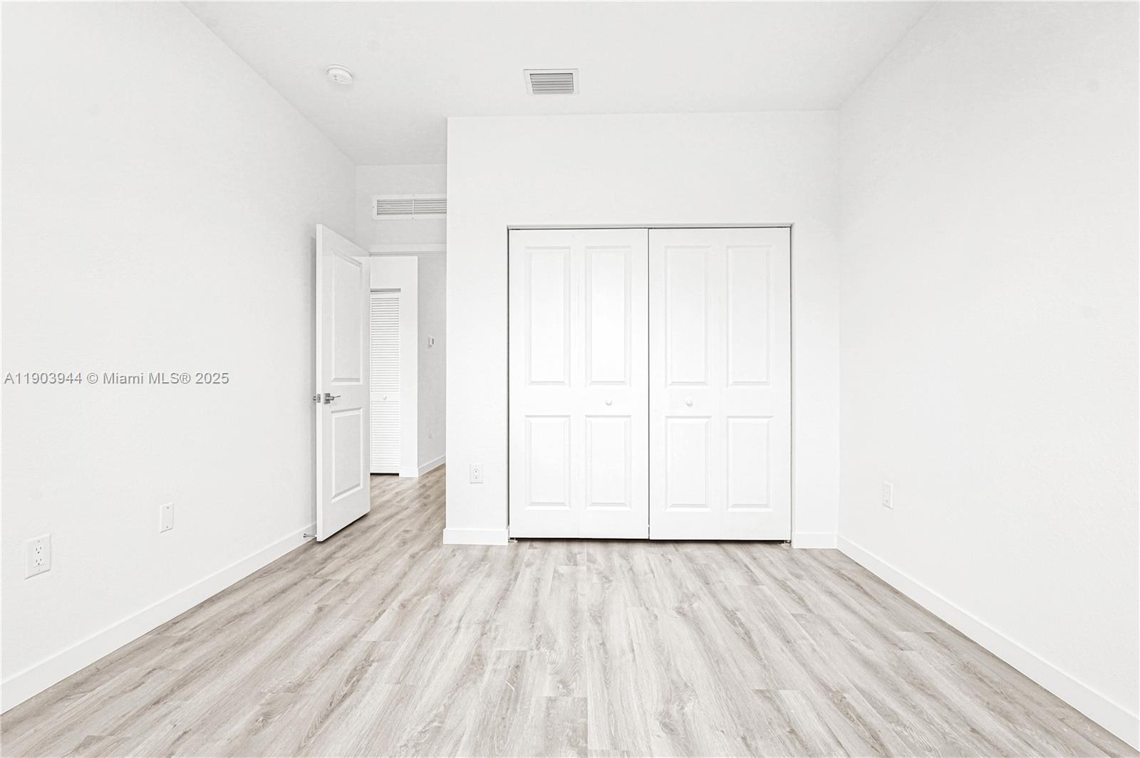 22555 Southwest 125th Avenue, Unit 13A Miami, FL 33170 - Photo 84 of 100 a view of room with wooden floor