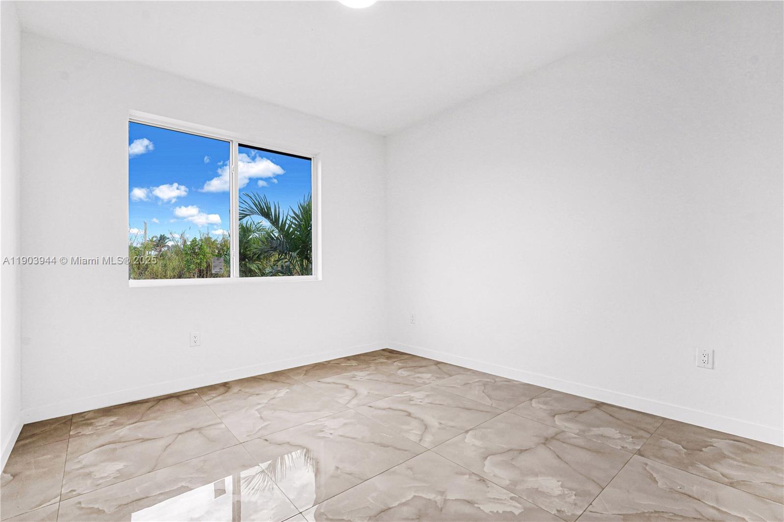 22555 Southwest 125th Avenue, Unit 13A Miami, FL 33170 - Photo 100 of 100 an empty room with a window