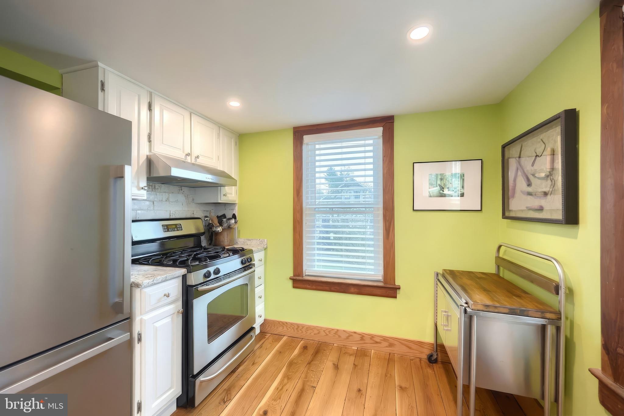 24 Park Street Jacobus, PA 17407 - Photo 12 of 40 a kitchen with a stove a sink and a refrigerator