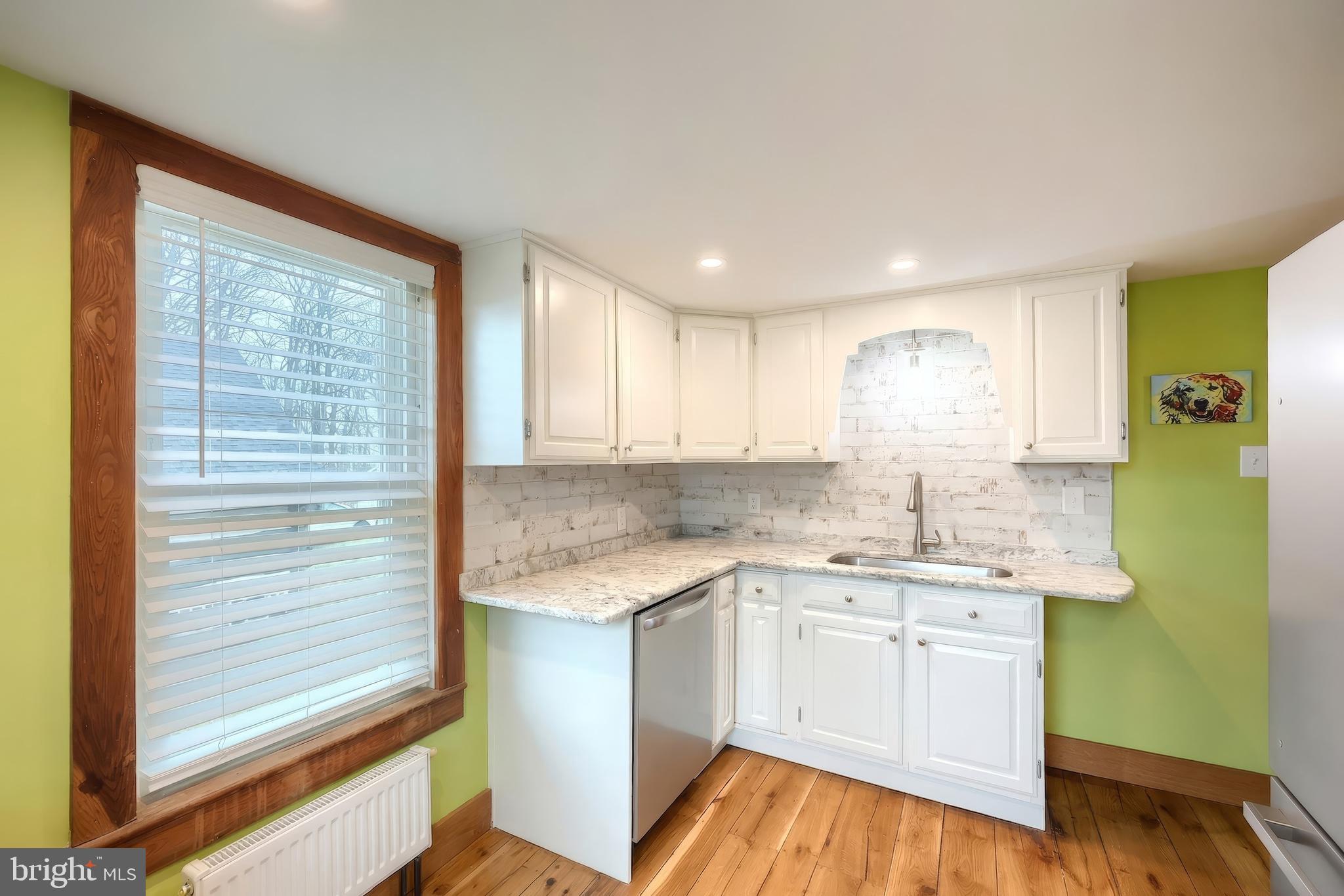 24 Park Street Jacobus, PA 17407 - Photo 13 of 40 a kitchen with a sink and cabinets