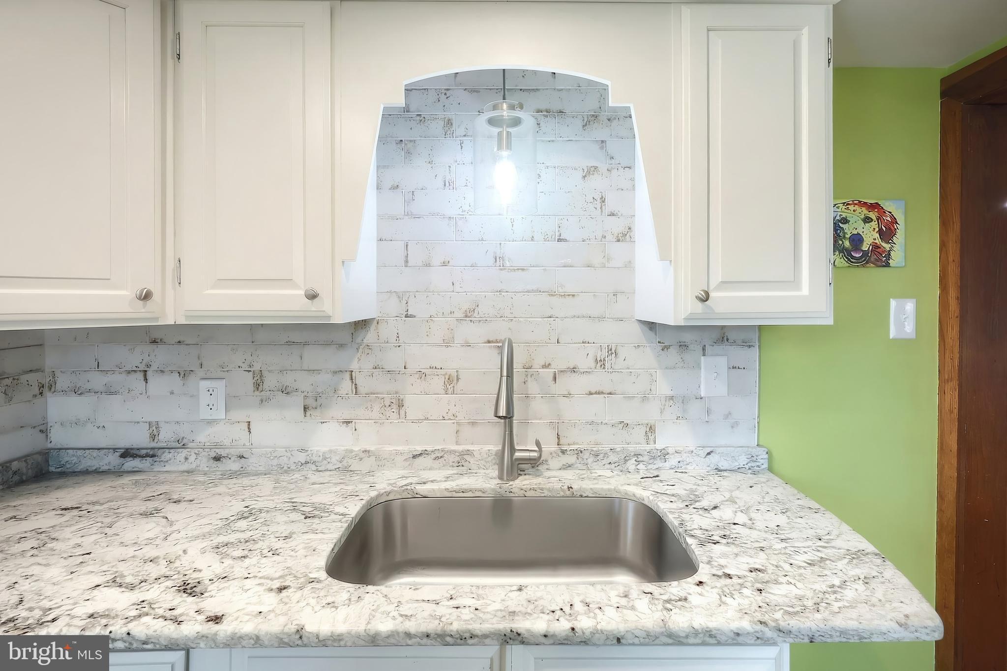 24 Park Street Jacobus, PA 17407 - Photo 14 of 40 a kitchen with granite countertop a sink and granite counter tops