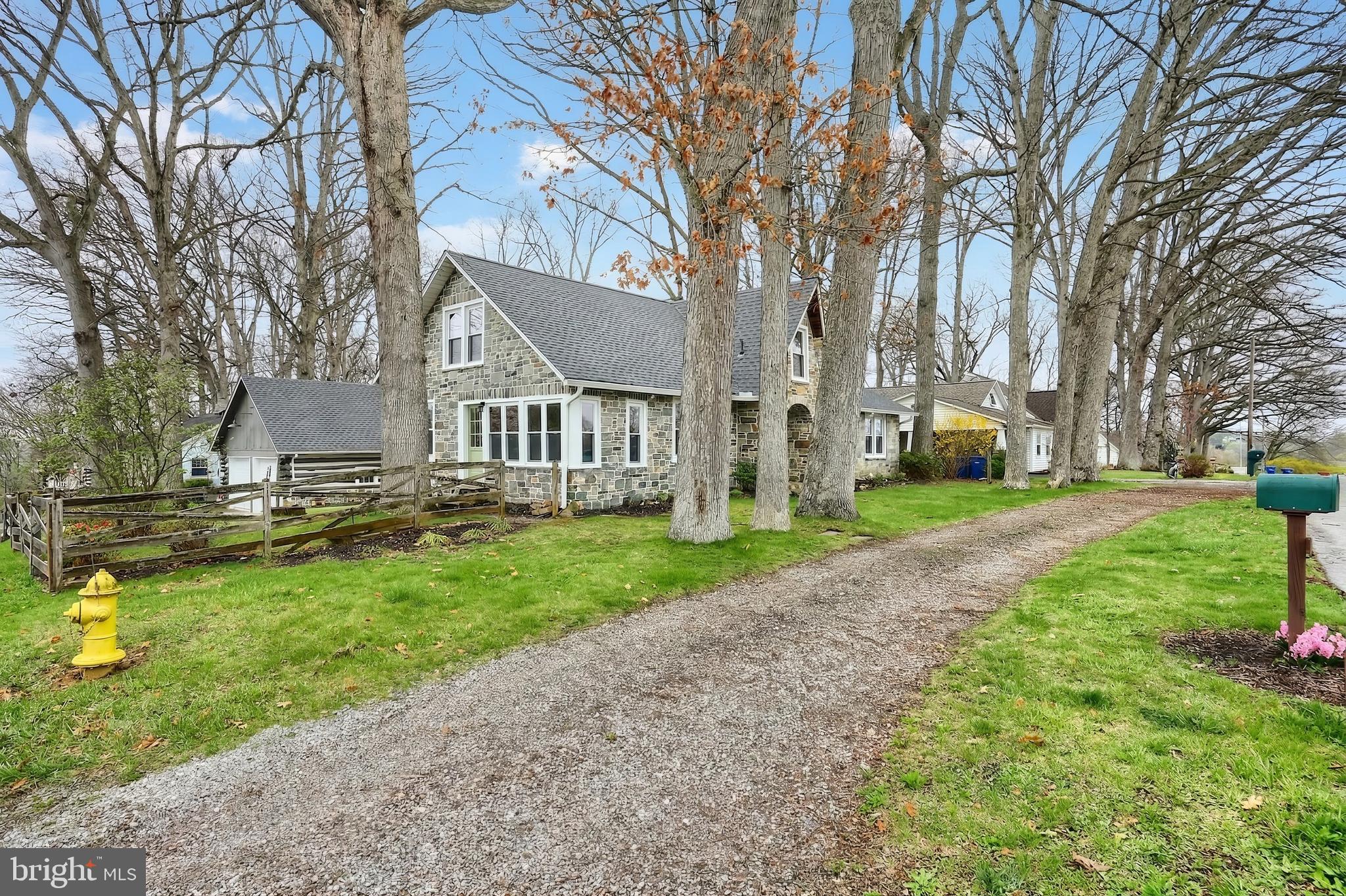 24 Park Street Jacobus, PA 17407 - Photo 2 of 40 a view of a house with backyard and a tree