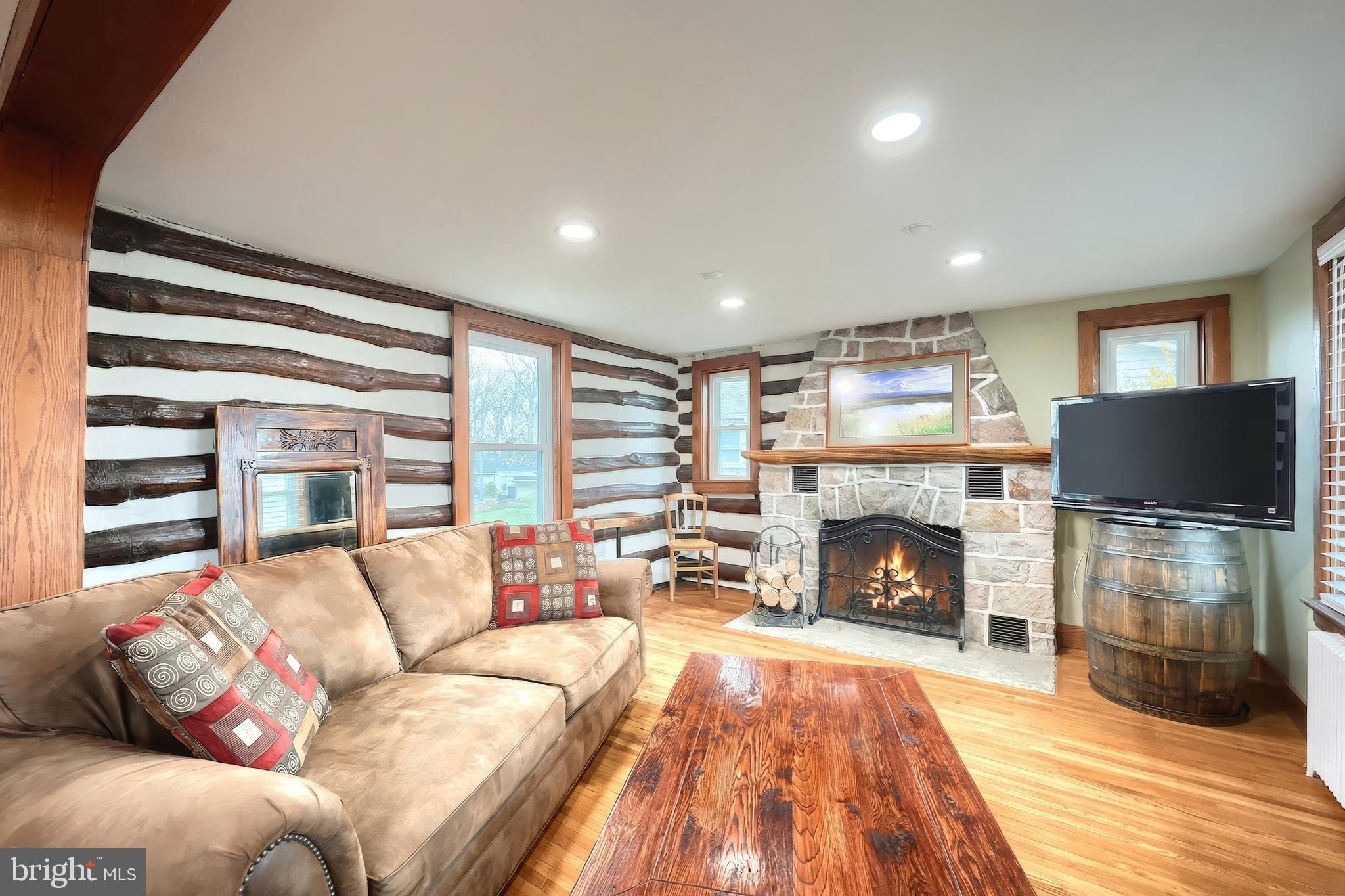24 Park Street Jacobus, PA 17407 - Photo 22 of 40 a living room with furniture and a fireplace