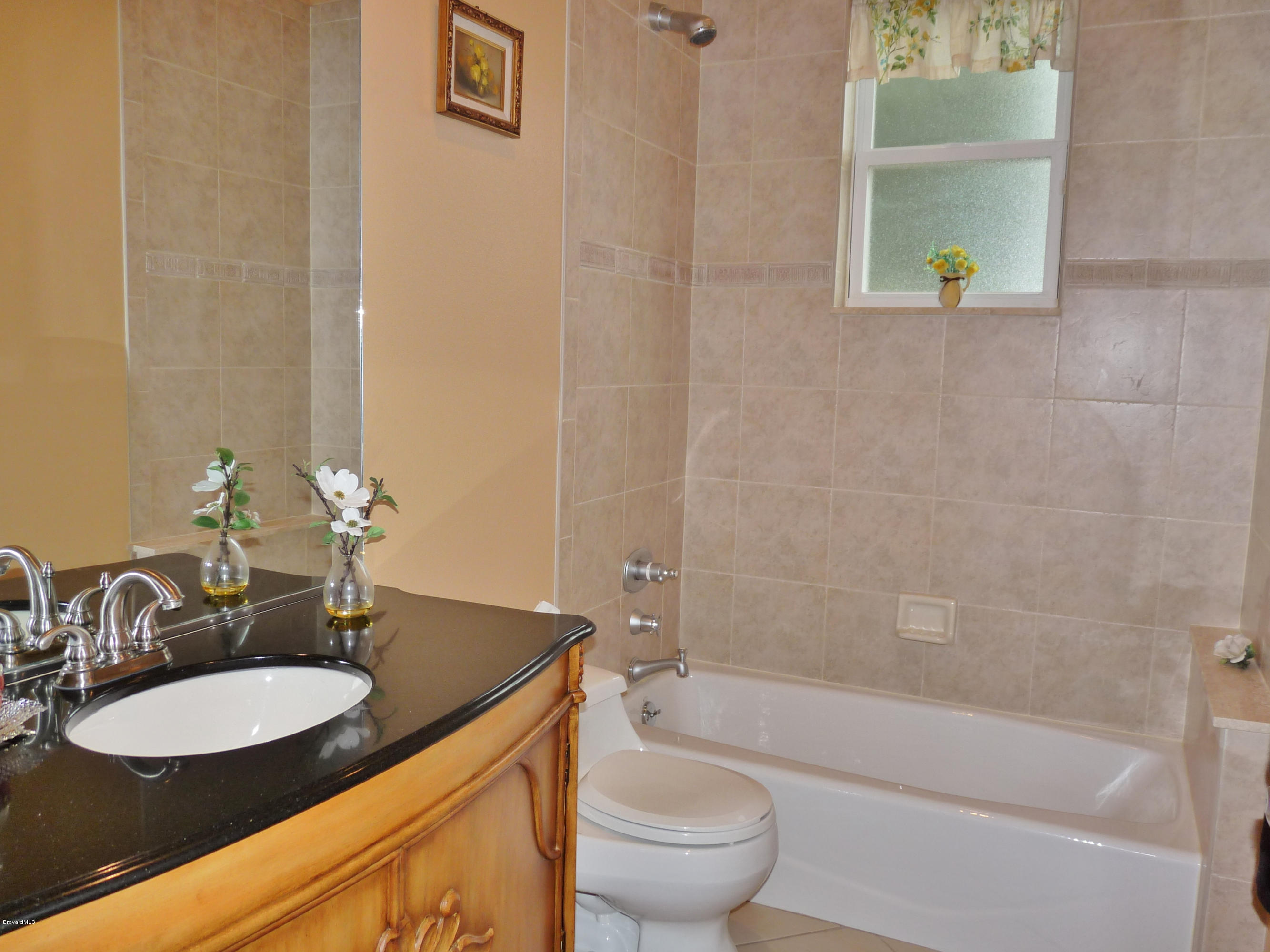 890 Maple Ridge Drive Merritt Island, FL 32952 - Photo 14 of 25 Bathroom 3