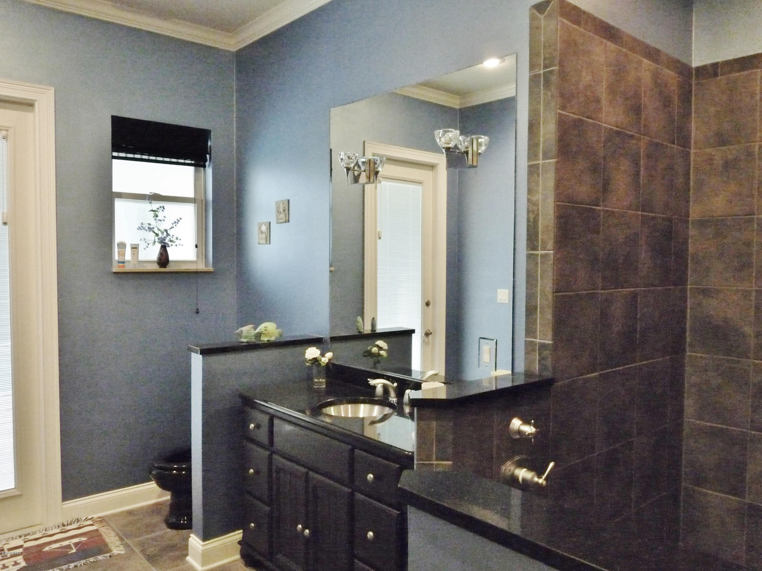 890 Maple Ridge Drive Merritt Island, FL 32952 - Photo 15 of 25 Bathroom 2