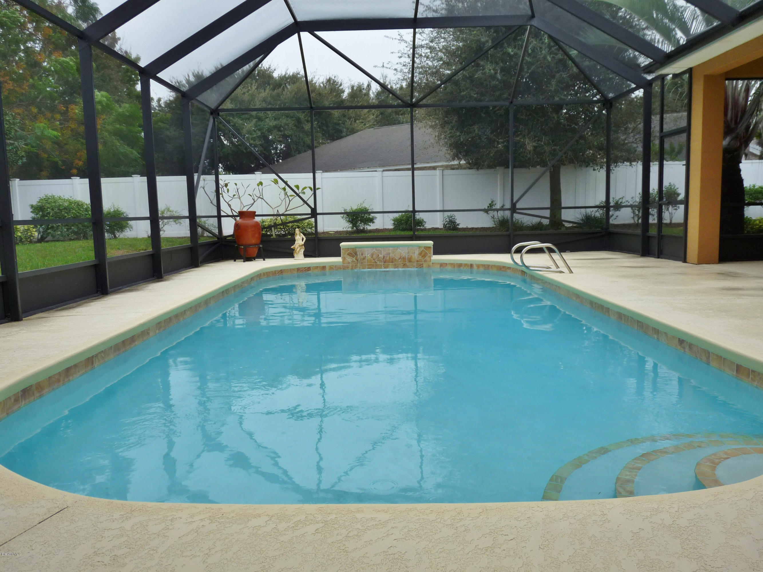890 Maple Ridge Drive Merritt Island, FL 32952 - Photo 23 of 25 Pool with Waterfall