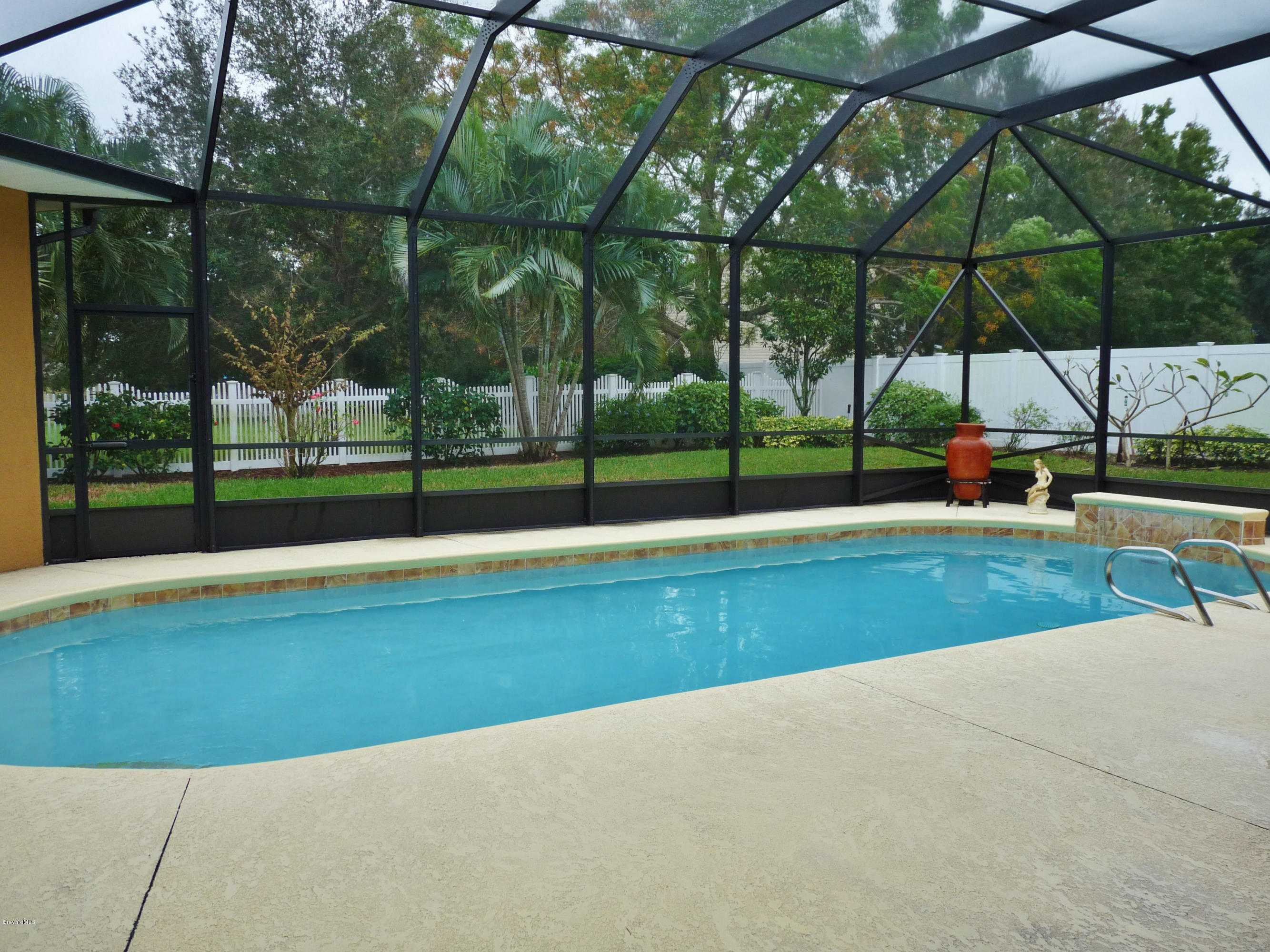890 Maple Ridge Drive Merritt Island, FL 32952 - Photo 25 of 25 Pool and Private Fenced Backyard