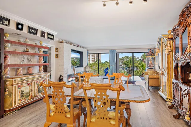 a room with lots of furniture and wooden floor