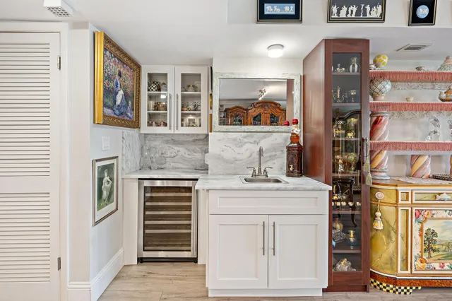 a kitchen with a stove and cabinets