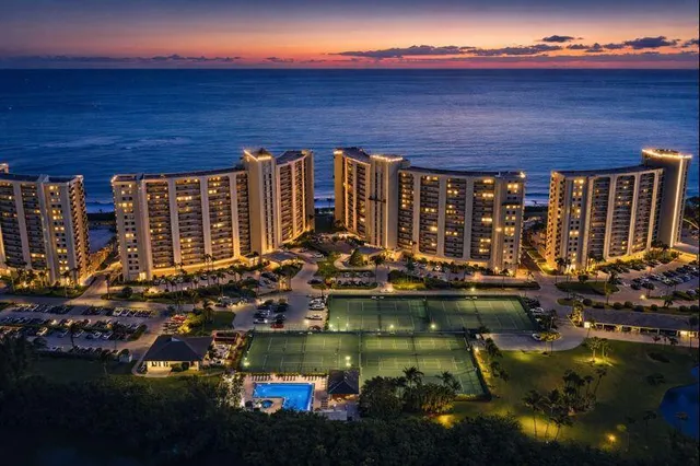 a view of swimming pool with outdoor seating