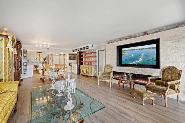 a living room with furniture and a flat screen tv