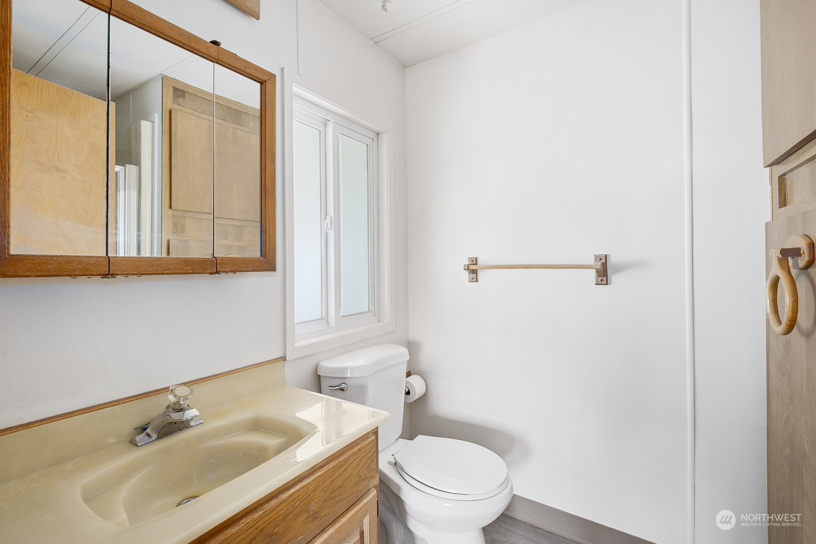 2302 R Street Southeast, Unit 140 Auburn, WA 98002 - Photo 13 of 18 a bathroom with a sink toilet and shower