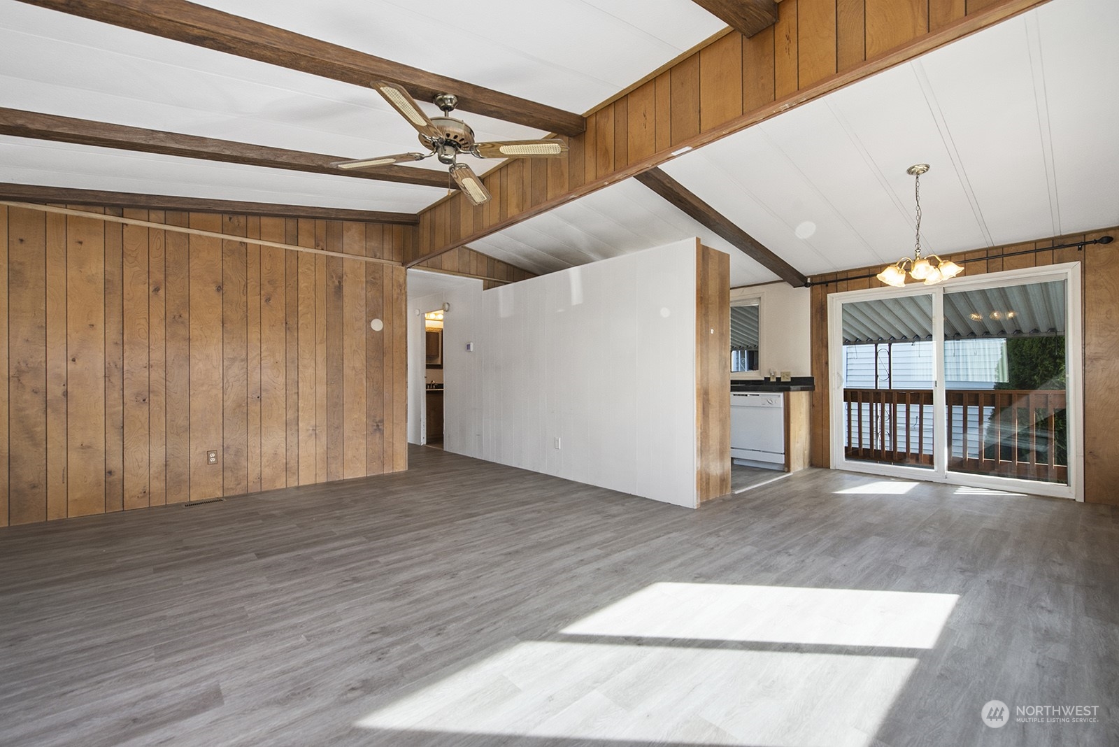 2302 R Street Southeast, Unit 140 Auburn, WA 98002 - Photo 6 of 18 a view of a room with wooden floor