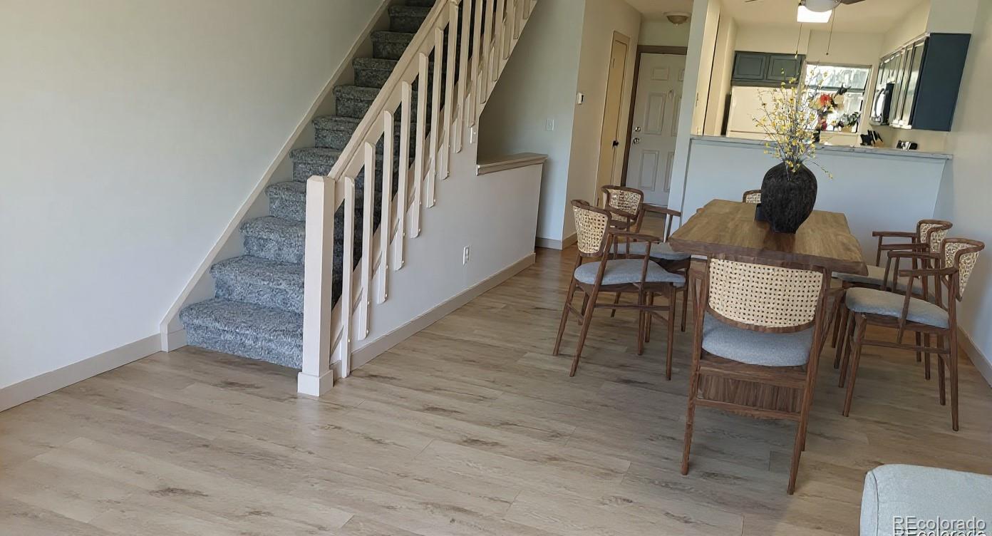 1818 South Quebec Way, Unit 57 Denver, CO 80231 - Photo 3 of 28 a view of entryway and hall with wooden floor