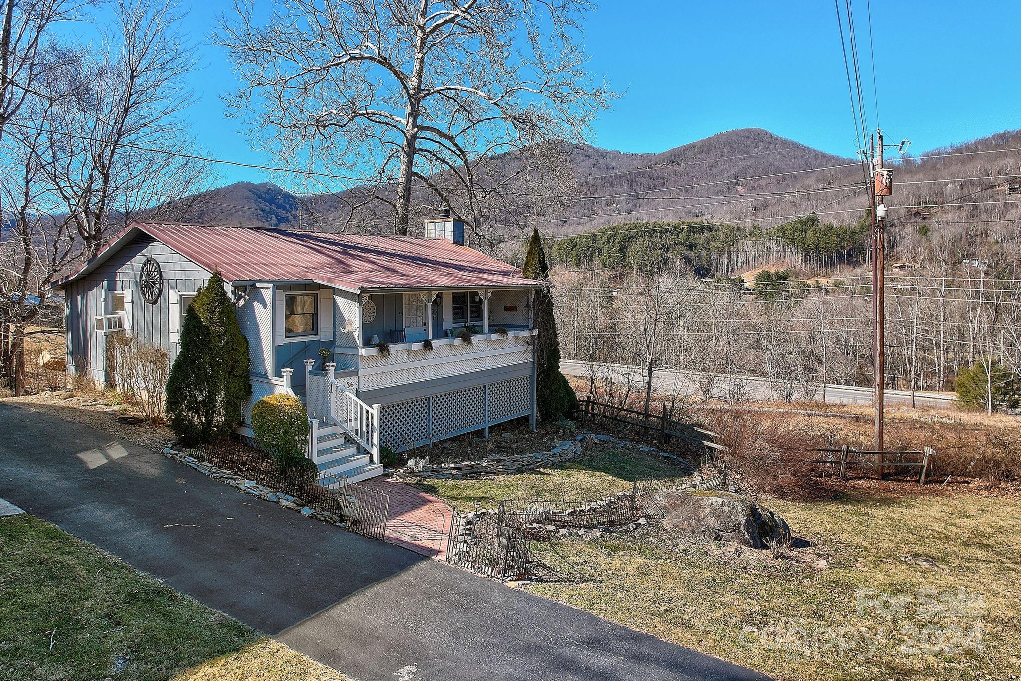 36 Brookside Lane Maggie Valley, NC 28751 - Photo 39 of 48 a view of a house with a yard