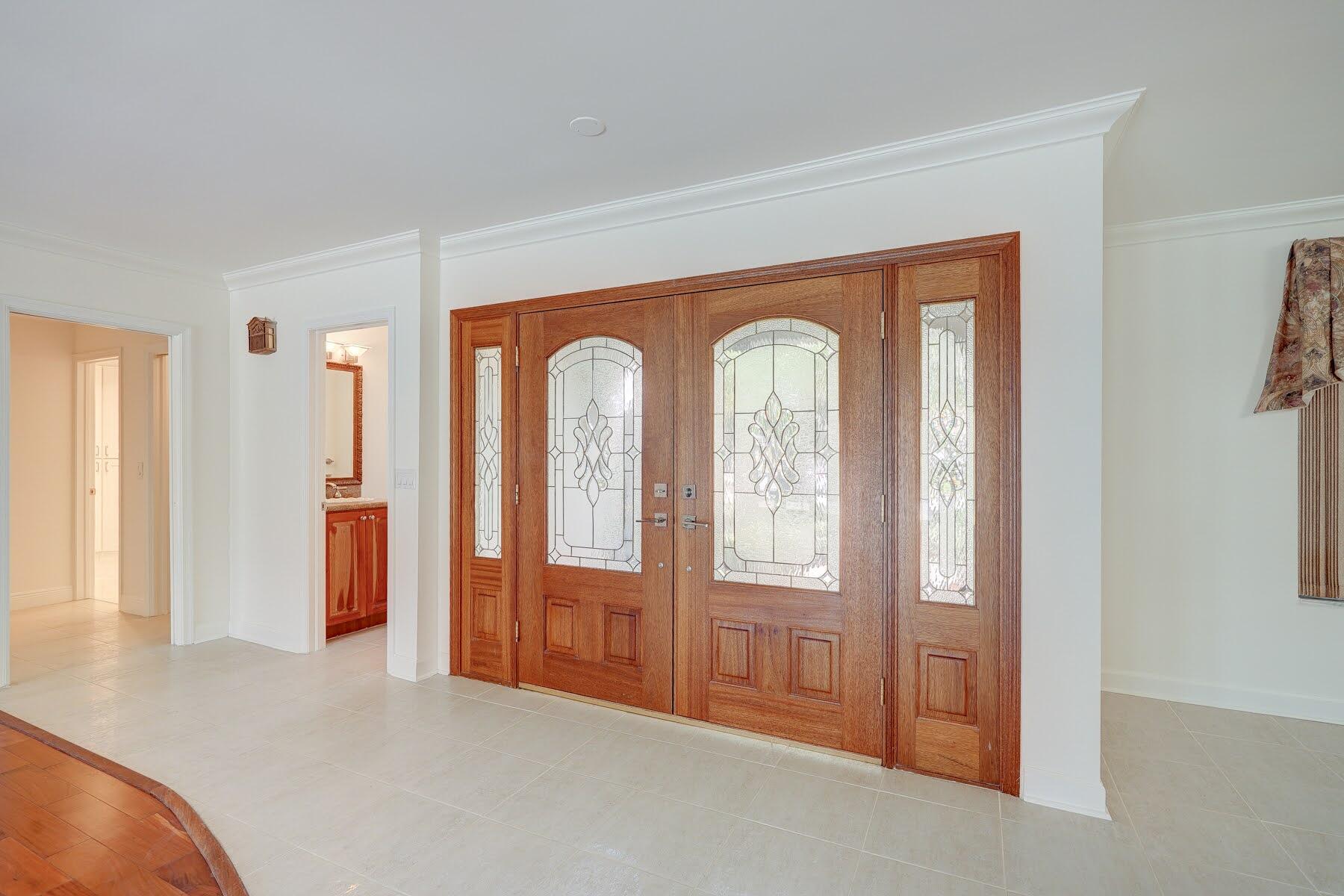 752 Southwest 36th Avenue Delray Beach, FL 33445 - Photo 16 of 40 an empty room with windows