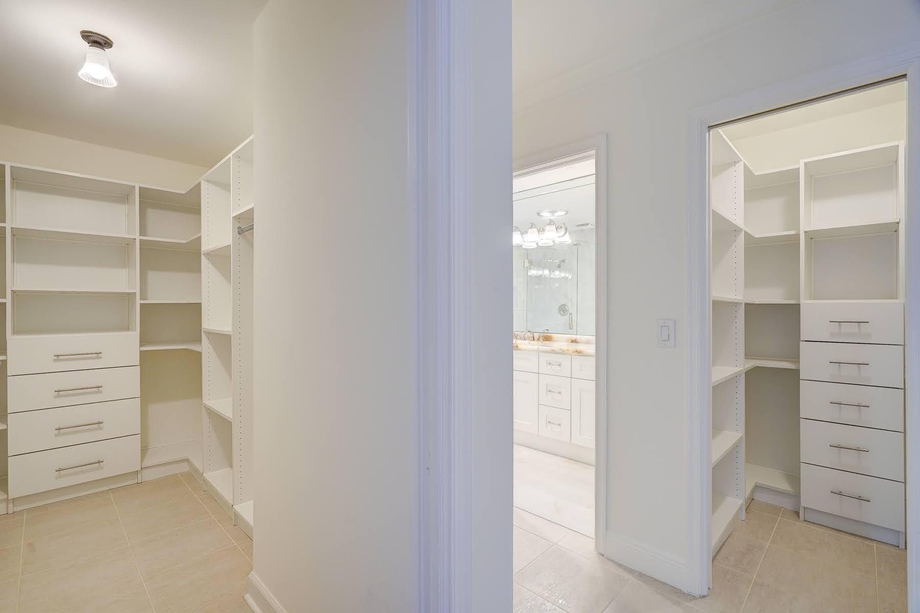 752 Southwest 36th Avenue Delray Beach, FL 33445 - Photo 23 of 40 a view of walk in closet with clothes