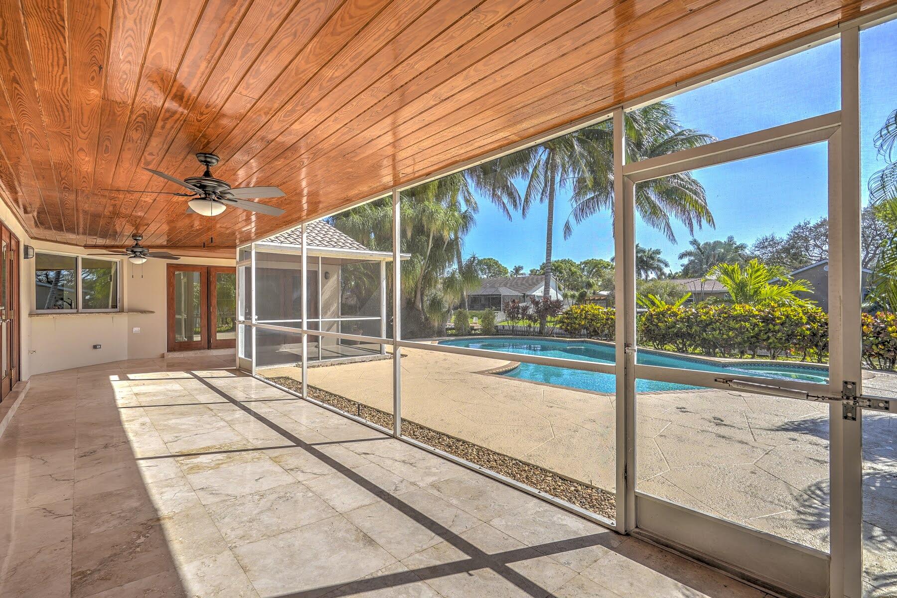 752 Southwest 36th Avenue Delray Beach, FL 33445 - Photo 9 of 40 a house view with swimming pool and outdoor space