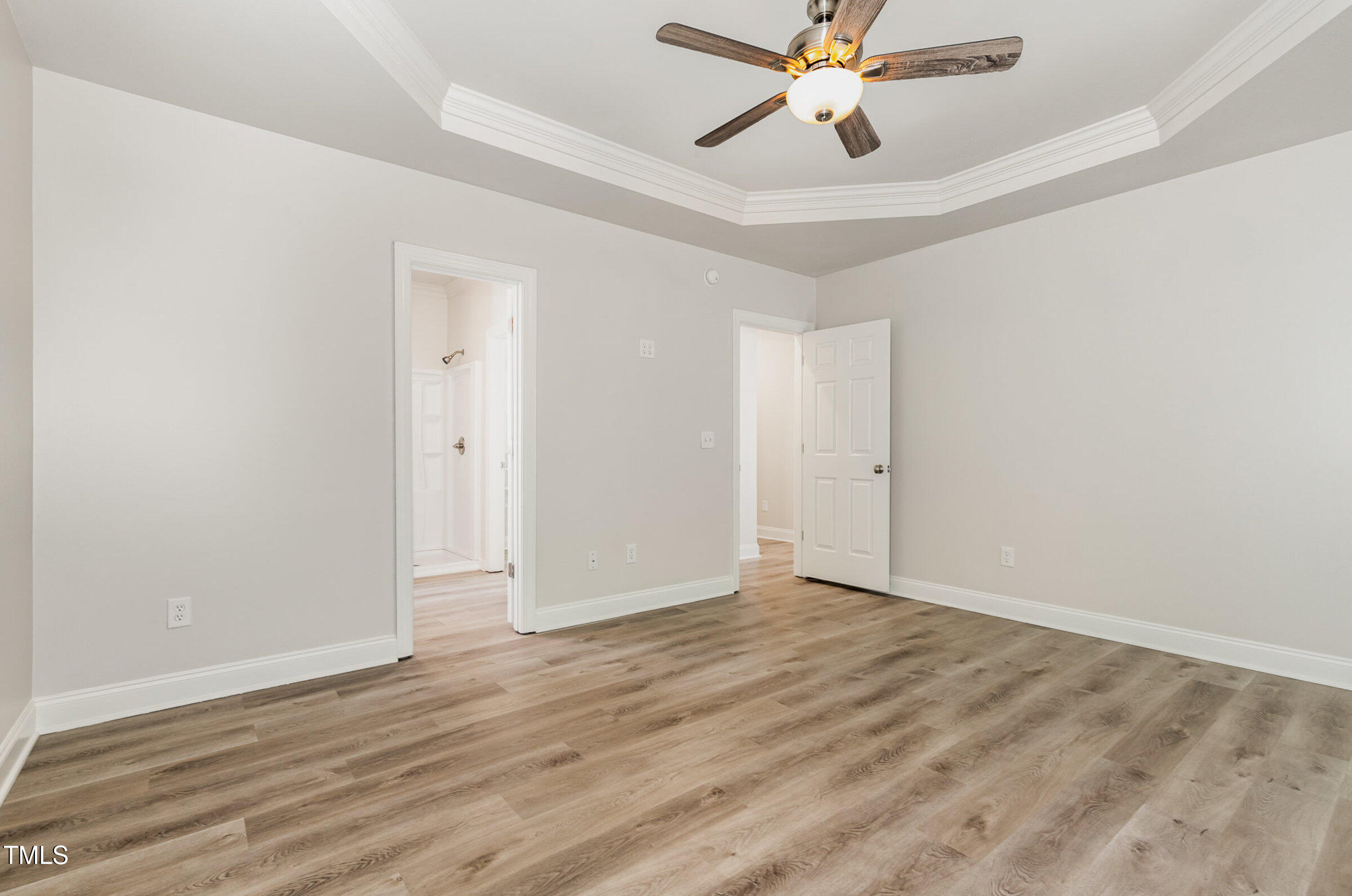 7936 Milltrace Run Raleigh, NC 27615 - Photo 11 of 21 wooden floor in an empty room