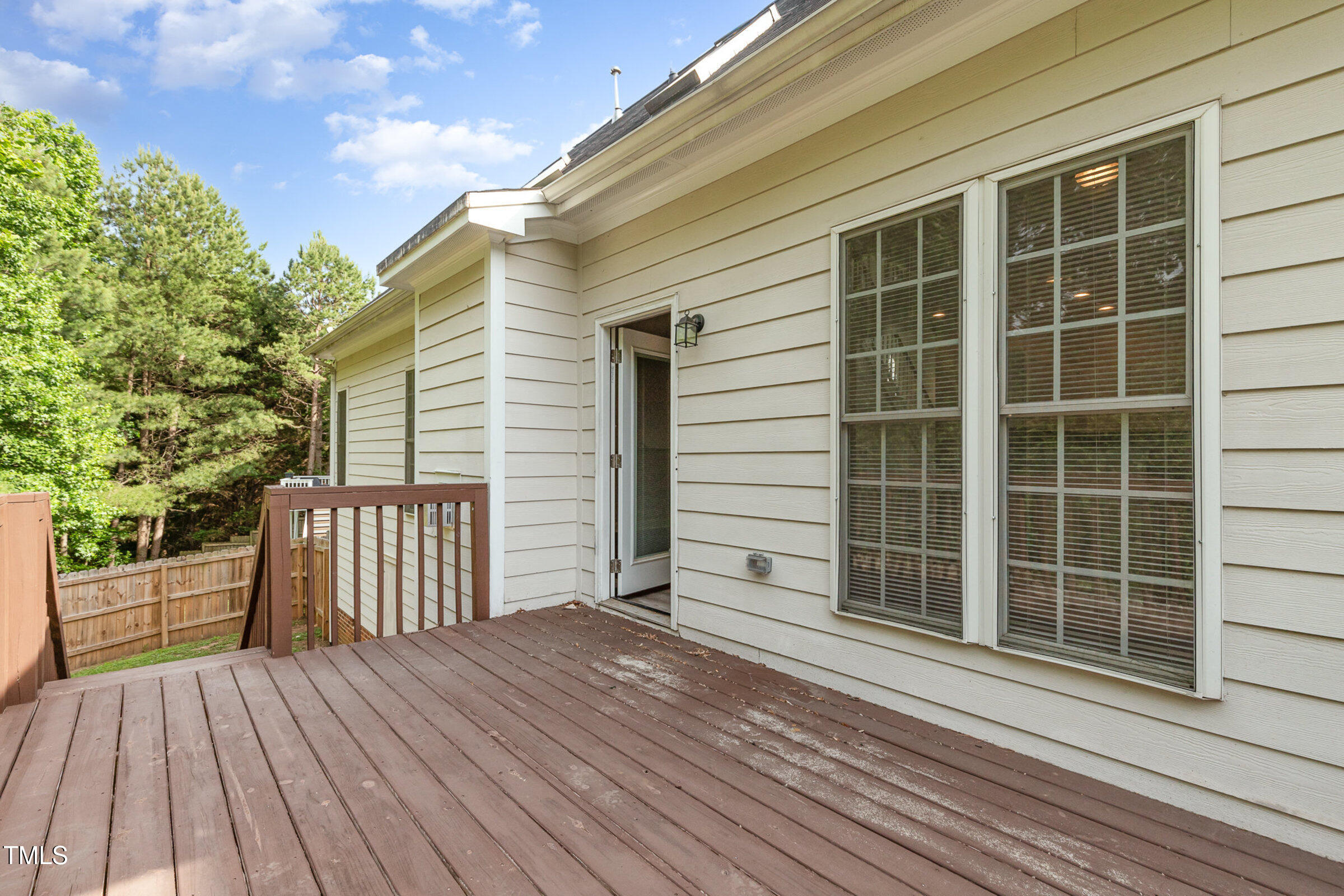 7936 Milltrace Run Raleigh, NC 27615 - Photo 18 of 21 a view of a house with a large window